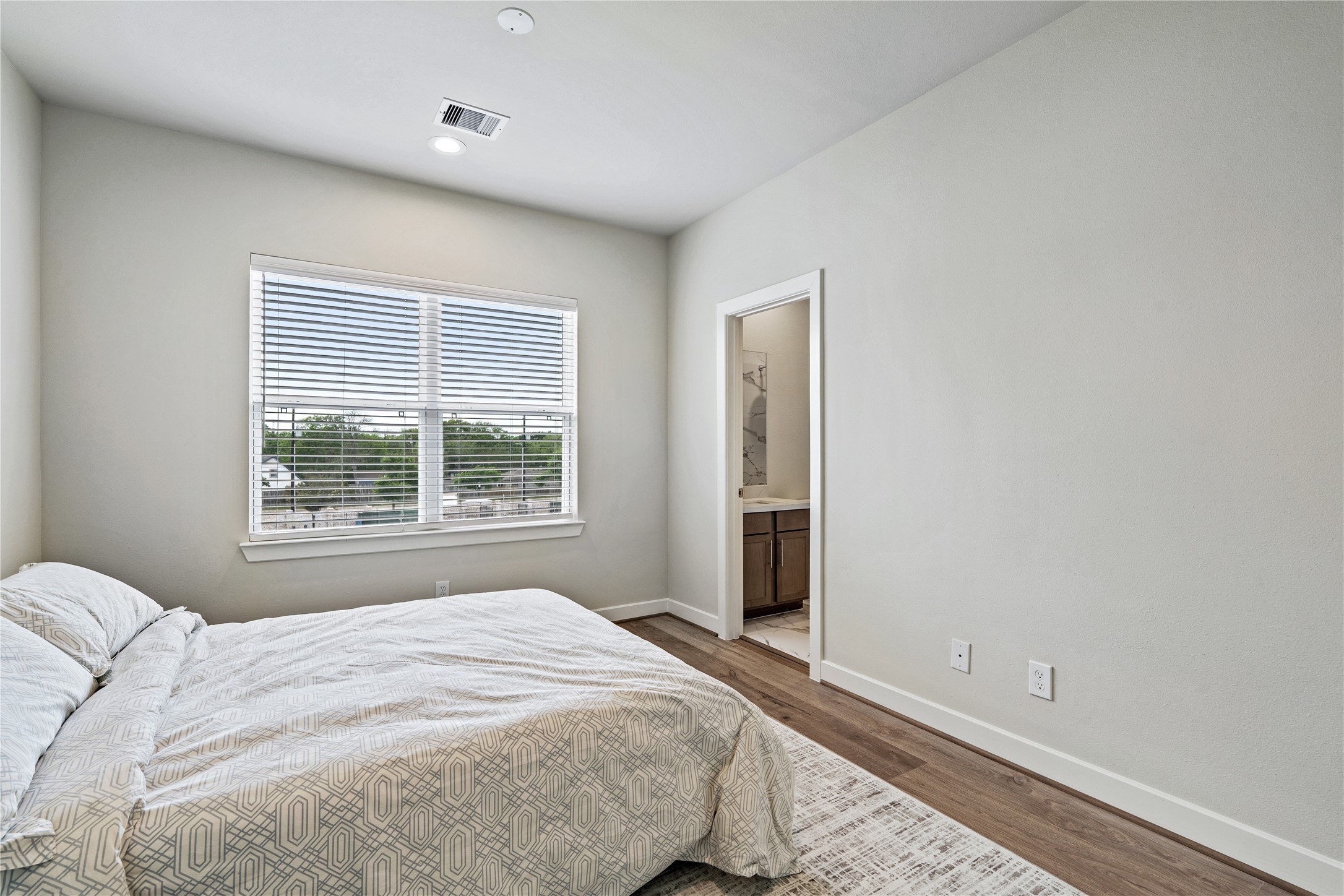 Representative photo showing the communitys model home secondary bedroom. Layout and selections may vary.