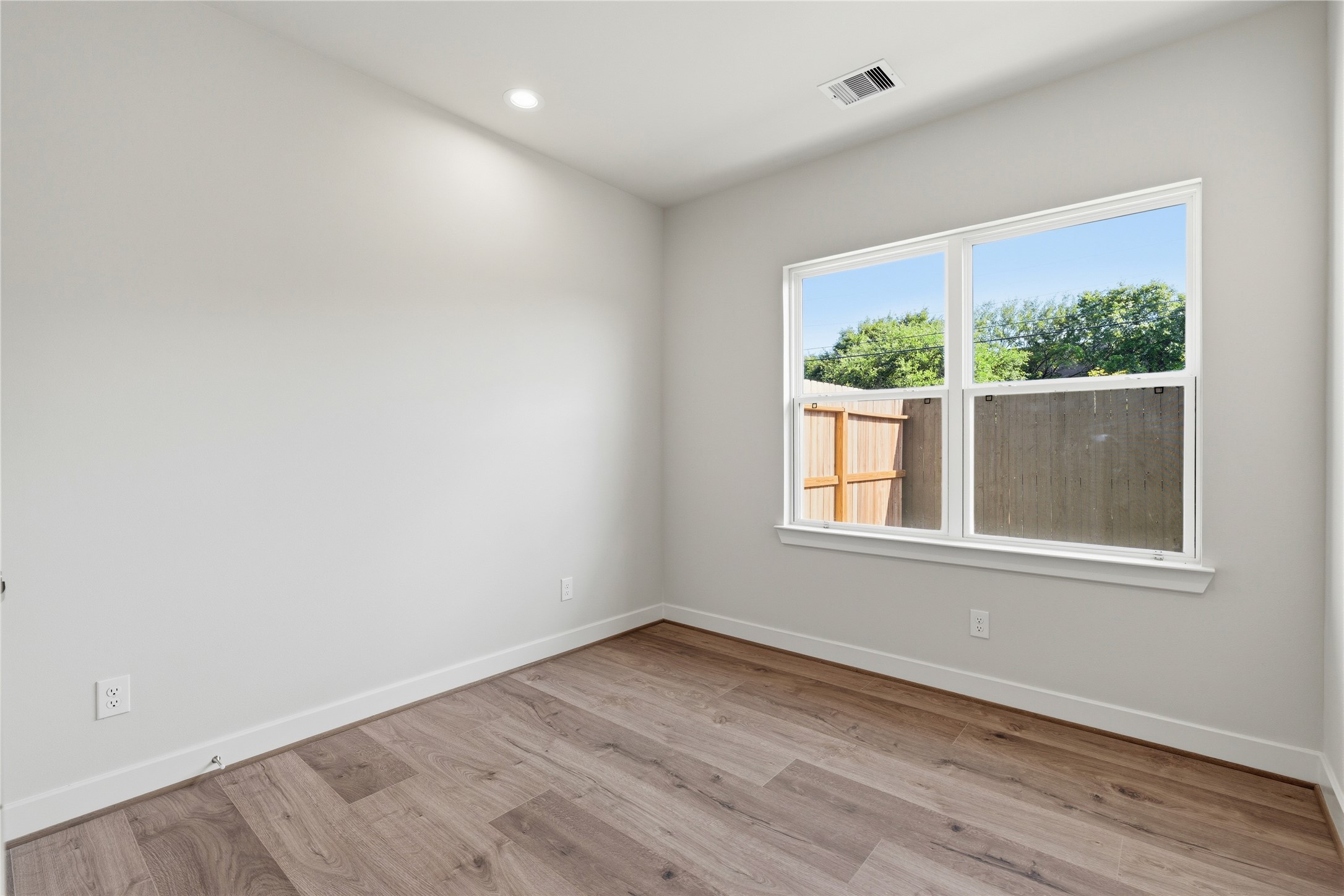 Representative photo showing the communitys model home secondary bedroom. Layout and selections may vary.