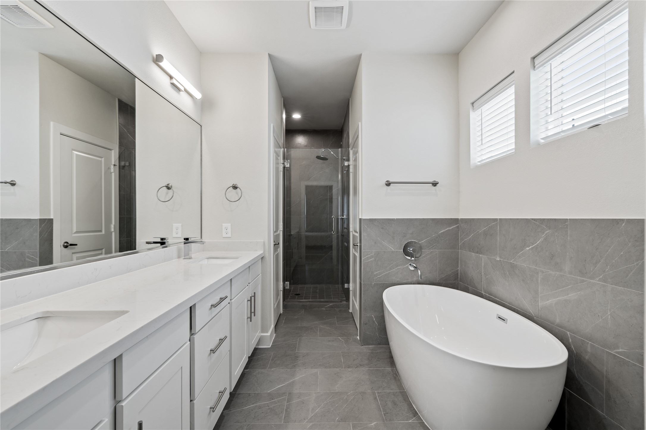 Representative photo showing the communitys model home primary bathroom. Layout and selections may vary.