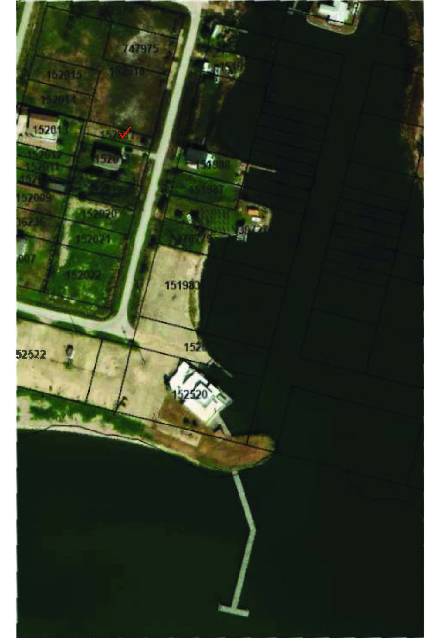 The aerial photo shows a waterfront view with multiple plots. A road runs alongside the subject lot and is an ideal location for water enthusiasts. The aerial photo shows a waterfront view with multiple plots. A road runs alongside the subject lot and is an ideal location for water enthusiasts.