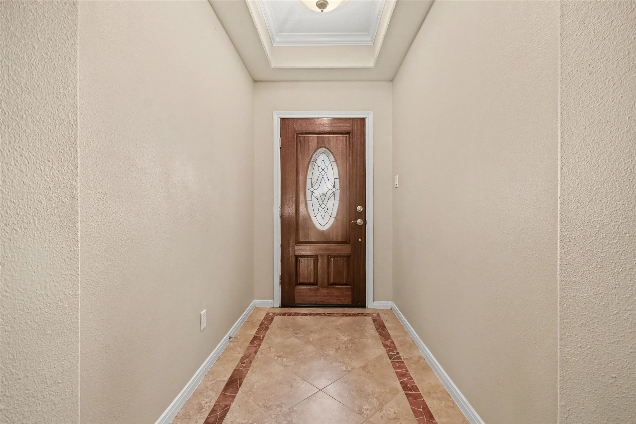 Impressive front decorative tile entry, and be sure to look up and see the interesting tray ceiling Impressive front decorative tile entry, and be sure to look up and see the interesting tray ceiling