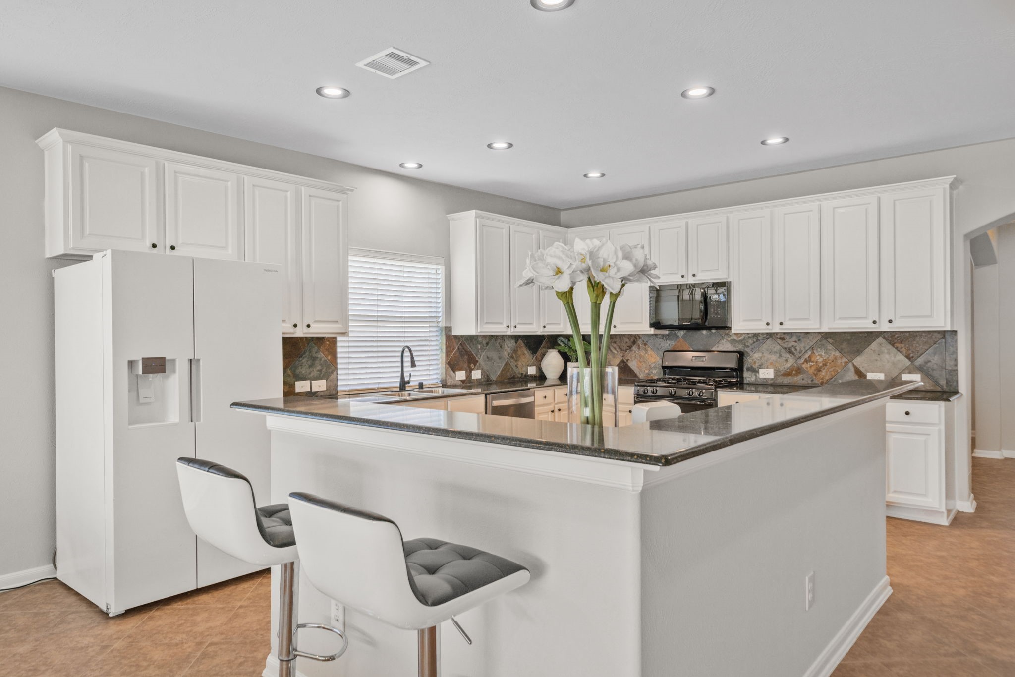 Large kitchen island perfect for cooking and entertaining.