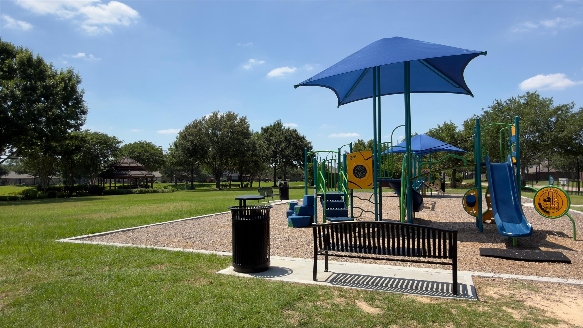 Community playground just steps away from the lake area.