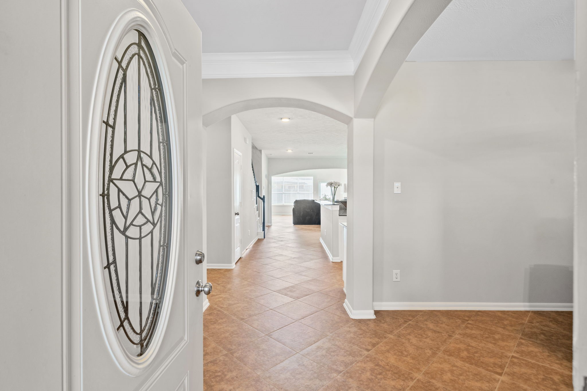 Elegant entry with beautiful front door and welcoming foyer.