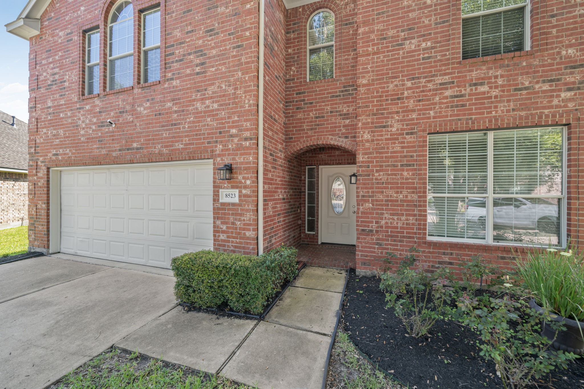 Beautiful brick elevation with welcoming front entrance.