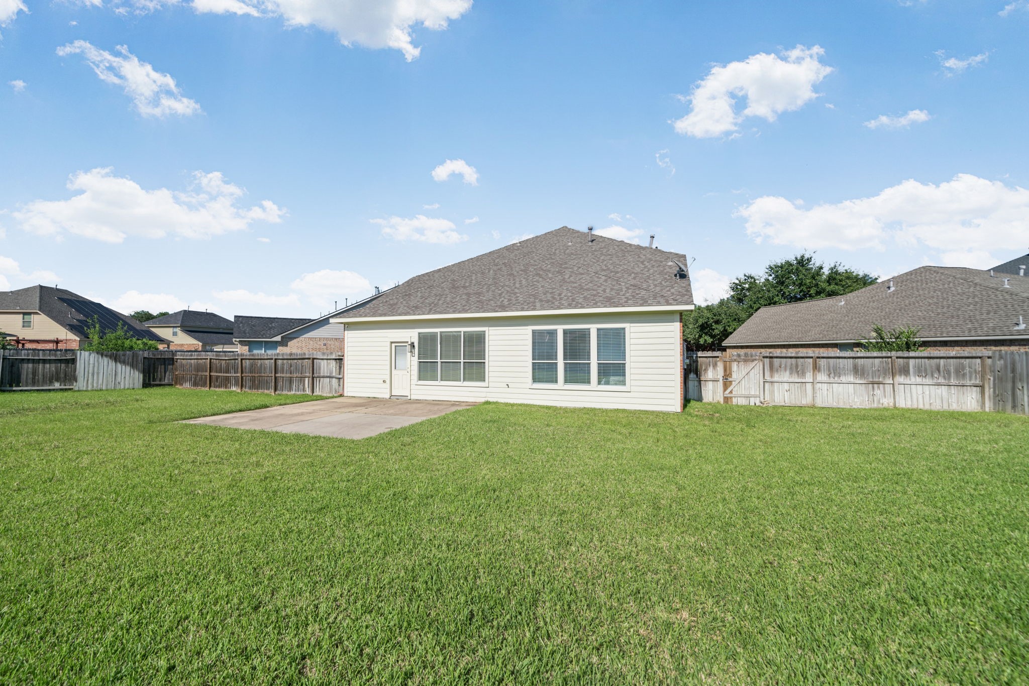 Expansive backyard with plenty of room for a pool or outdoor entertaining.