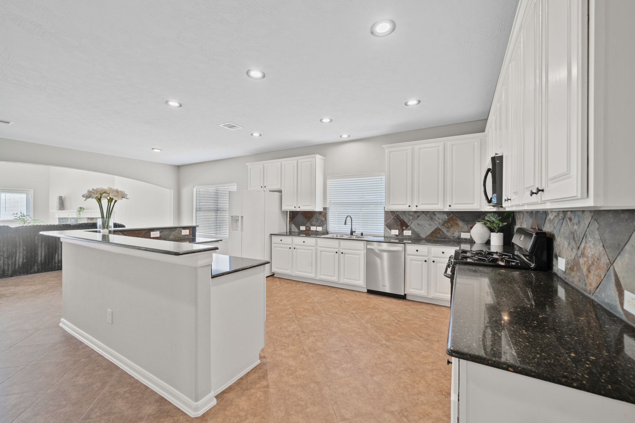 Large kitchen with plenty of prep space and storage.