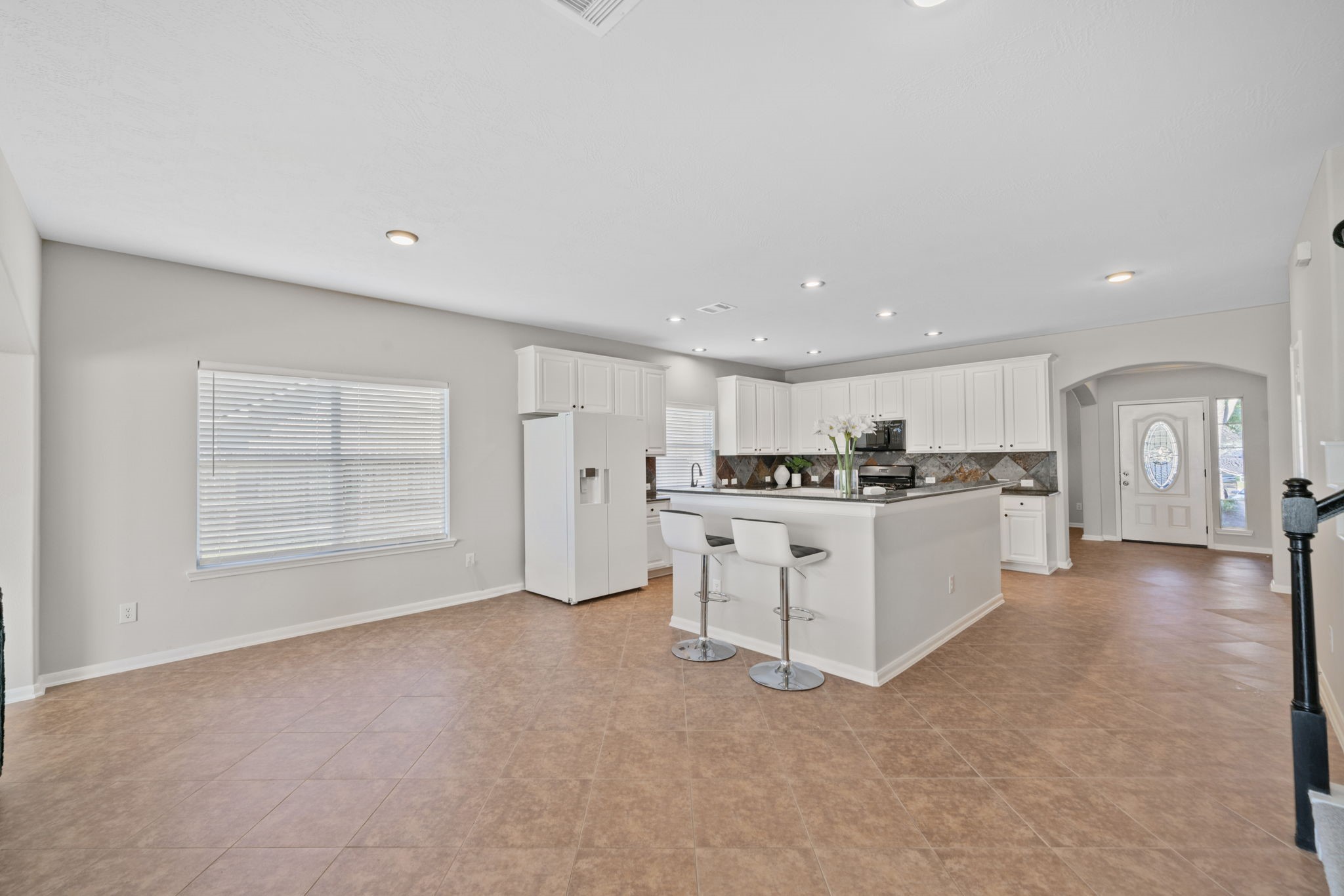 Spacious open-concept layout with abundant natural light.