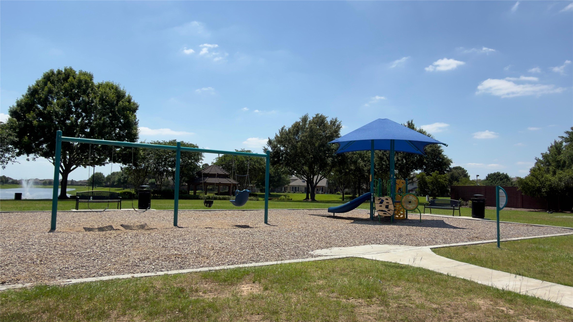 Community playground with gazebo, perfect for birthday parties and special gatherings by the park.