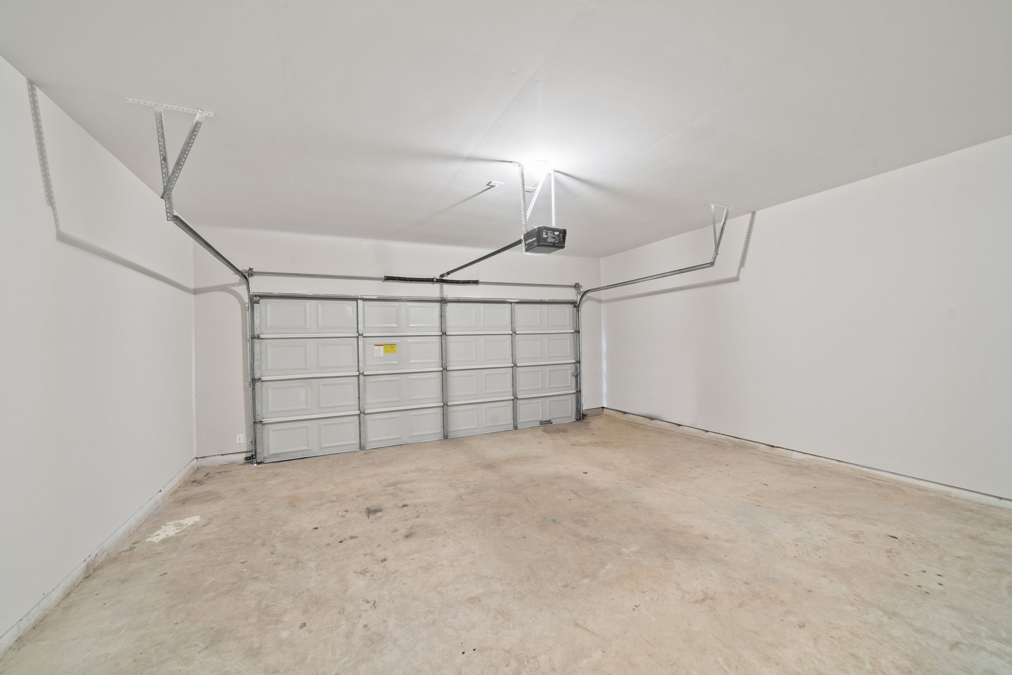 Spacious two-car garage with additional storage space