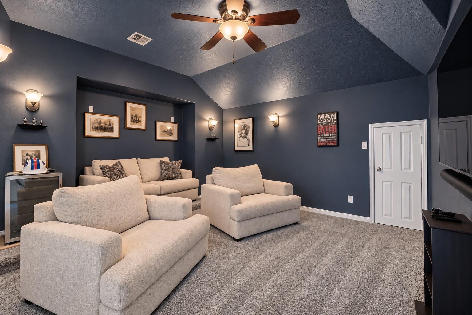 Just off the Game Room is this gem! This is the ONLY home in the neighborhood currently for sale with a dedicated MEDIA ROOM under $450K!!! It comes theater ready with sconce lighting and platform seating!