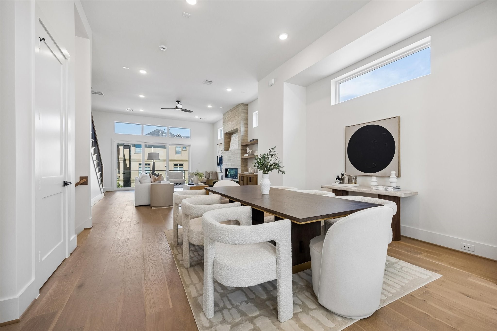 The dining room seamlessly connects the kitchen and living areas, perfect for entertaining in this open-concept space. Features a charming alcove (perfect for a buffet or console table) with a window.