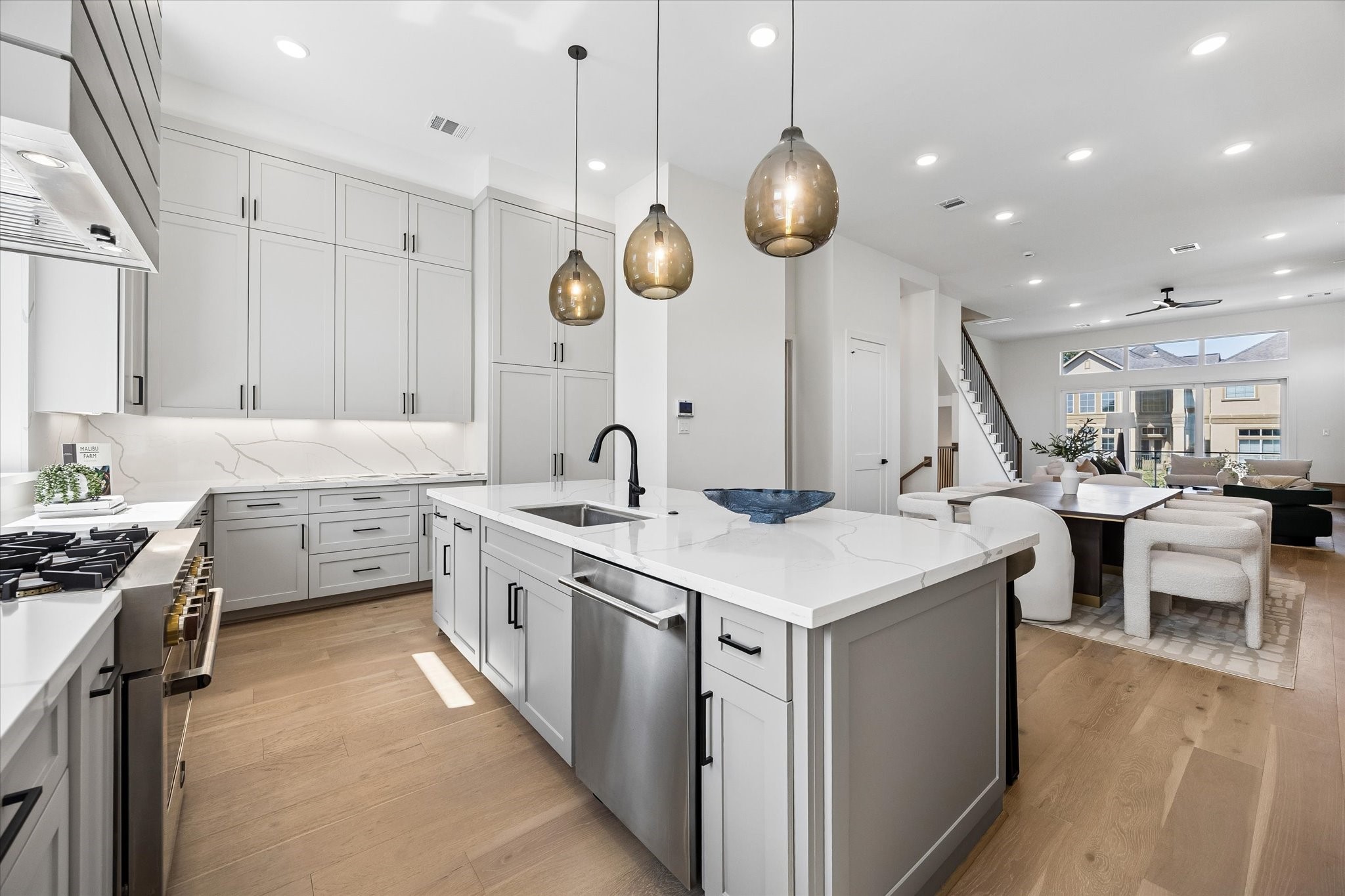 Another view of the kitchen looking towards the dining and living area. Ideal floor plan for everyday living and entertaining.