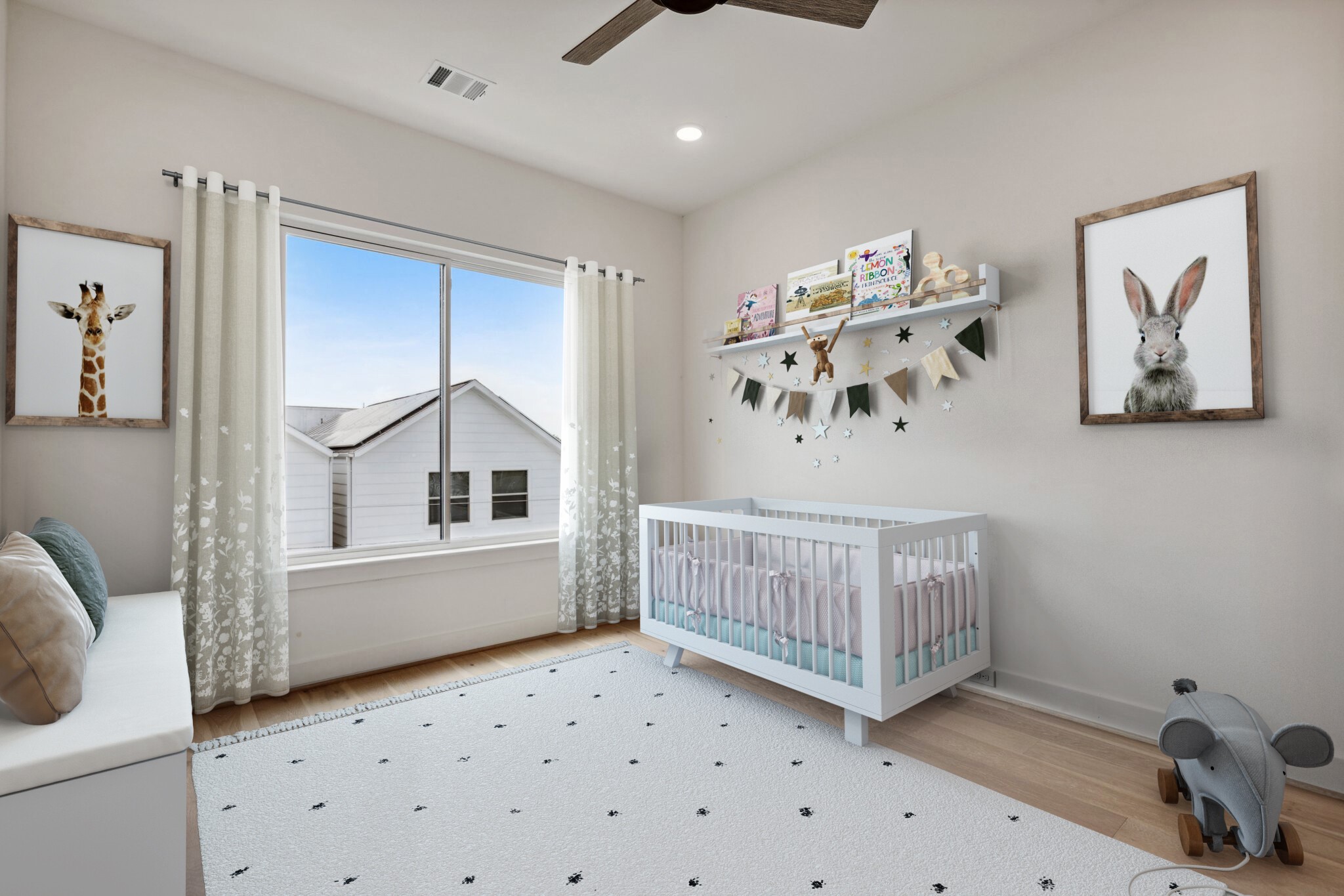 Located on the third floor alongside the primary suite, this spacious secondary bedroom #1 boasts upgraded oversized windows with stunning views of the Galleria and Downtown. Features a Visual Comfort ceiling fan and pre-wired for a future TV, its the perfect blend of comfort and convenience. Note: this photo has been virtually staged.