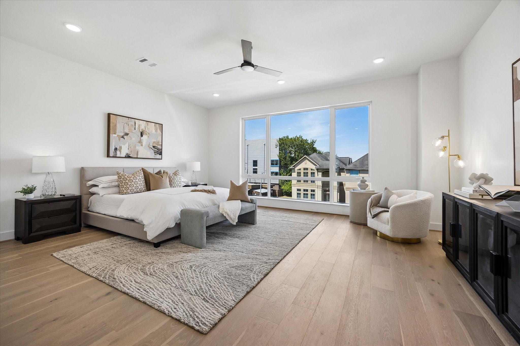 Retreat to the third-floor spacious primary suite, featuring 7.5 wide white oak Europea