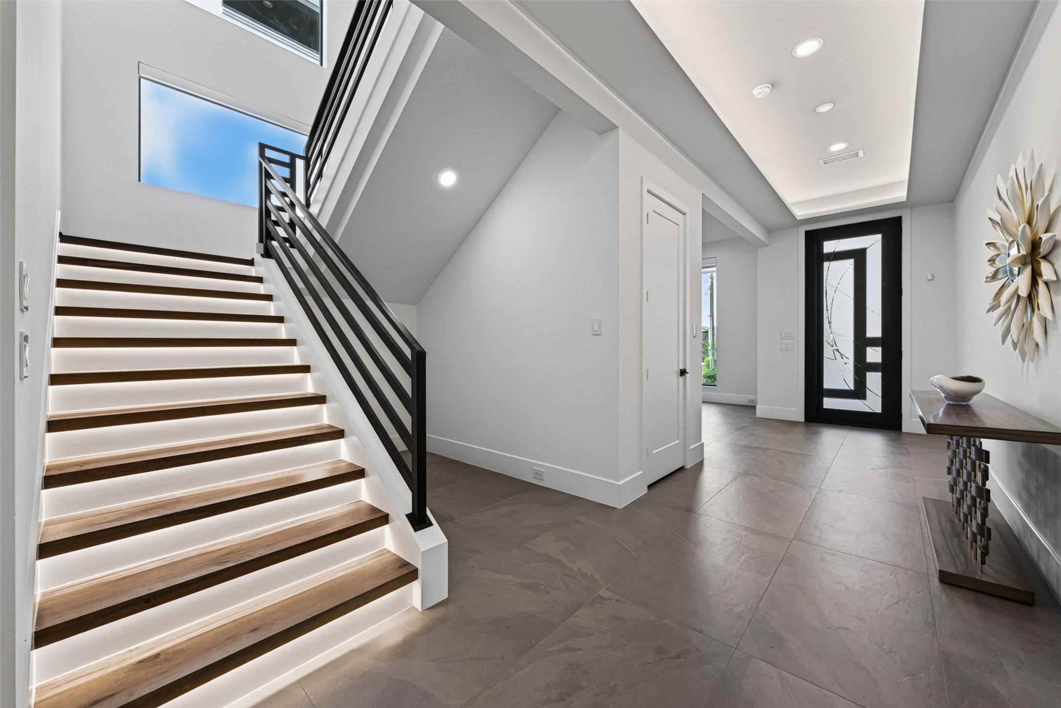 Alcove area as it is currently. Large format Italian porcelain tile can be found throughout the first floor. Alcove area as it is currently. Large format Italian porcelain tile can be found throughout the first floor.