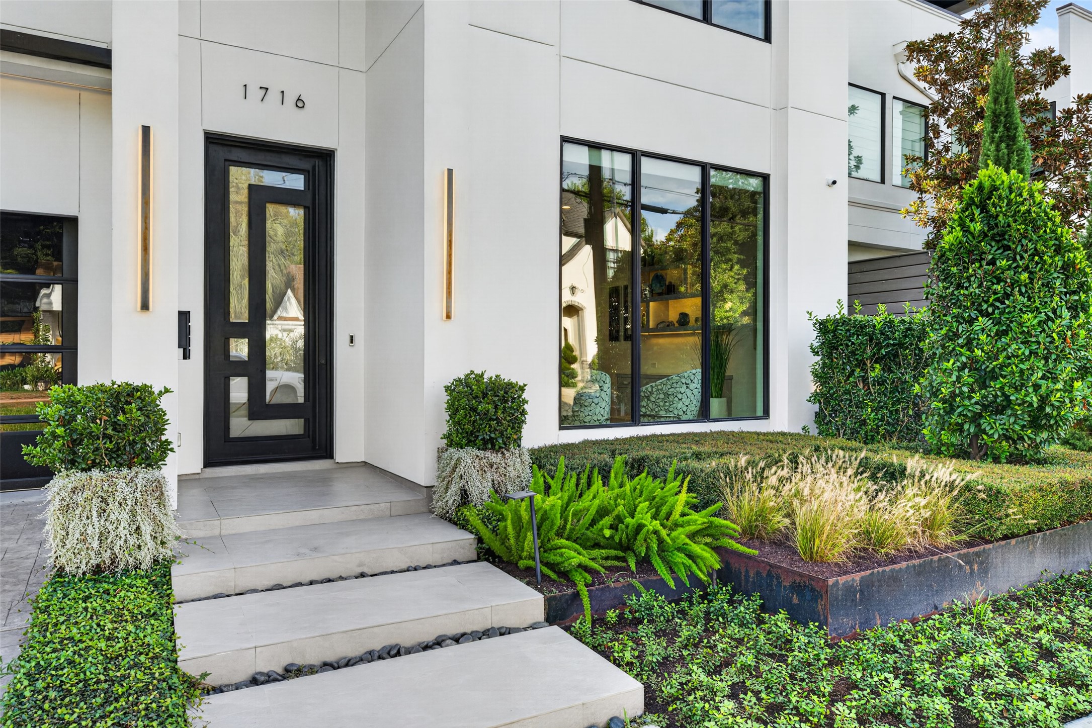 The facade of the home is framed with low maintenance landscaping and irrigation system. The facade of the home is framed with low maintenance landscaping and irrigation system.