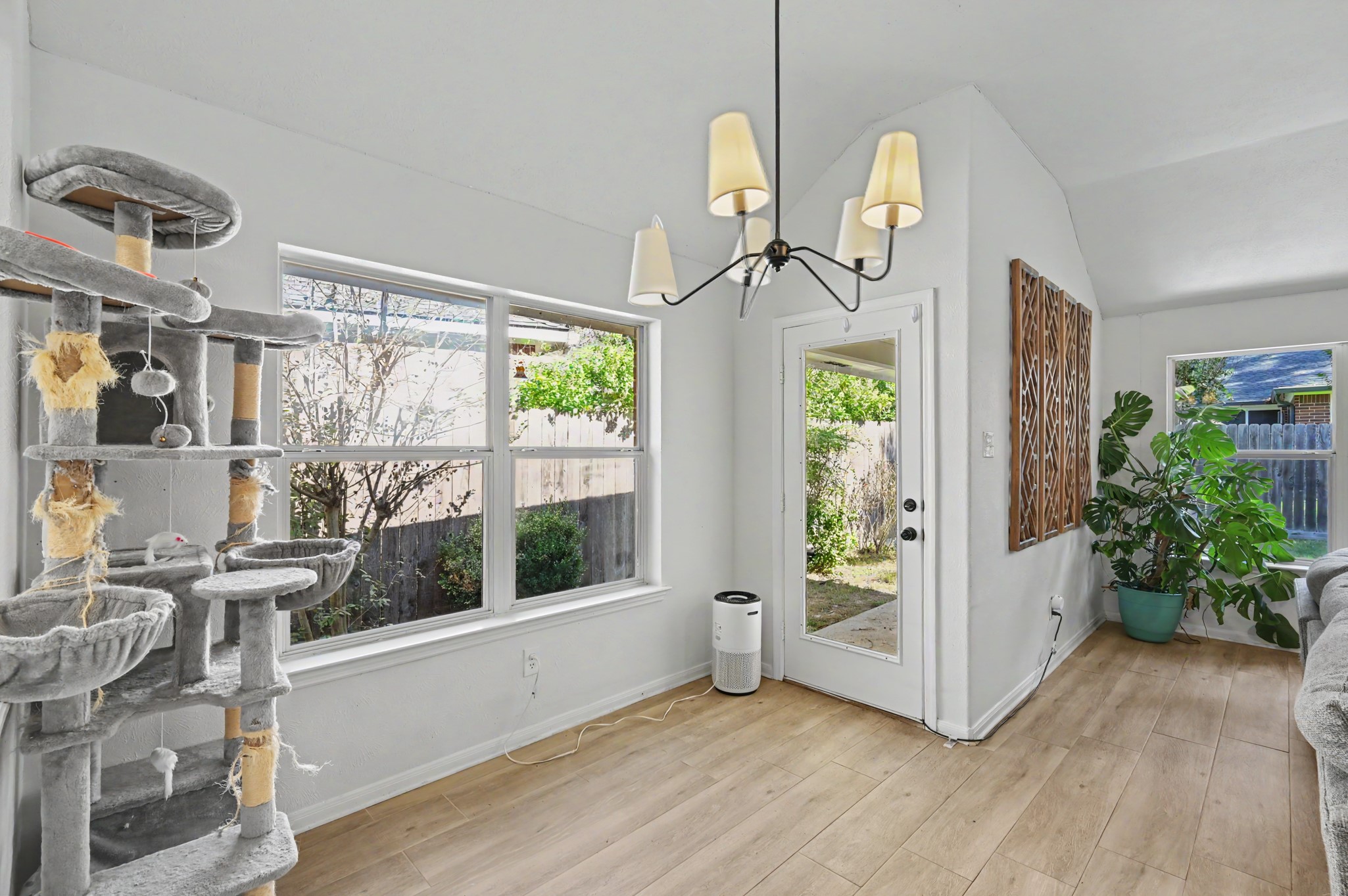 Extra space besides the windows leading to the covered porch and backyard.