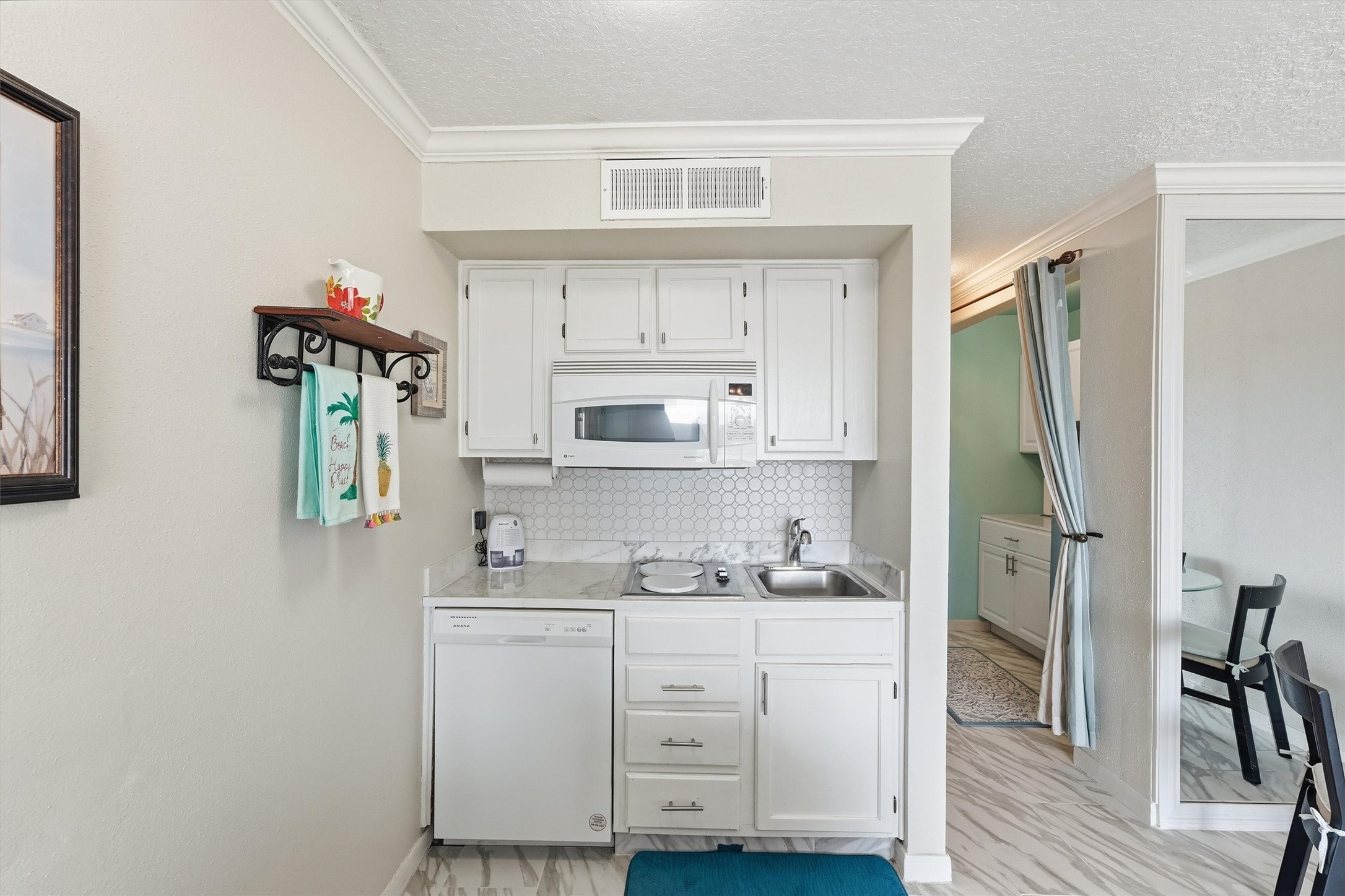 Kitchen opening to the dining area