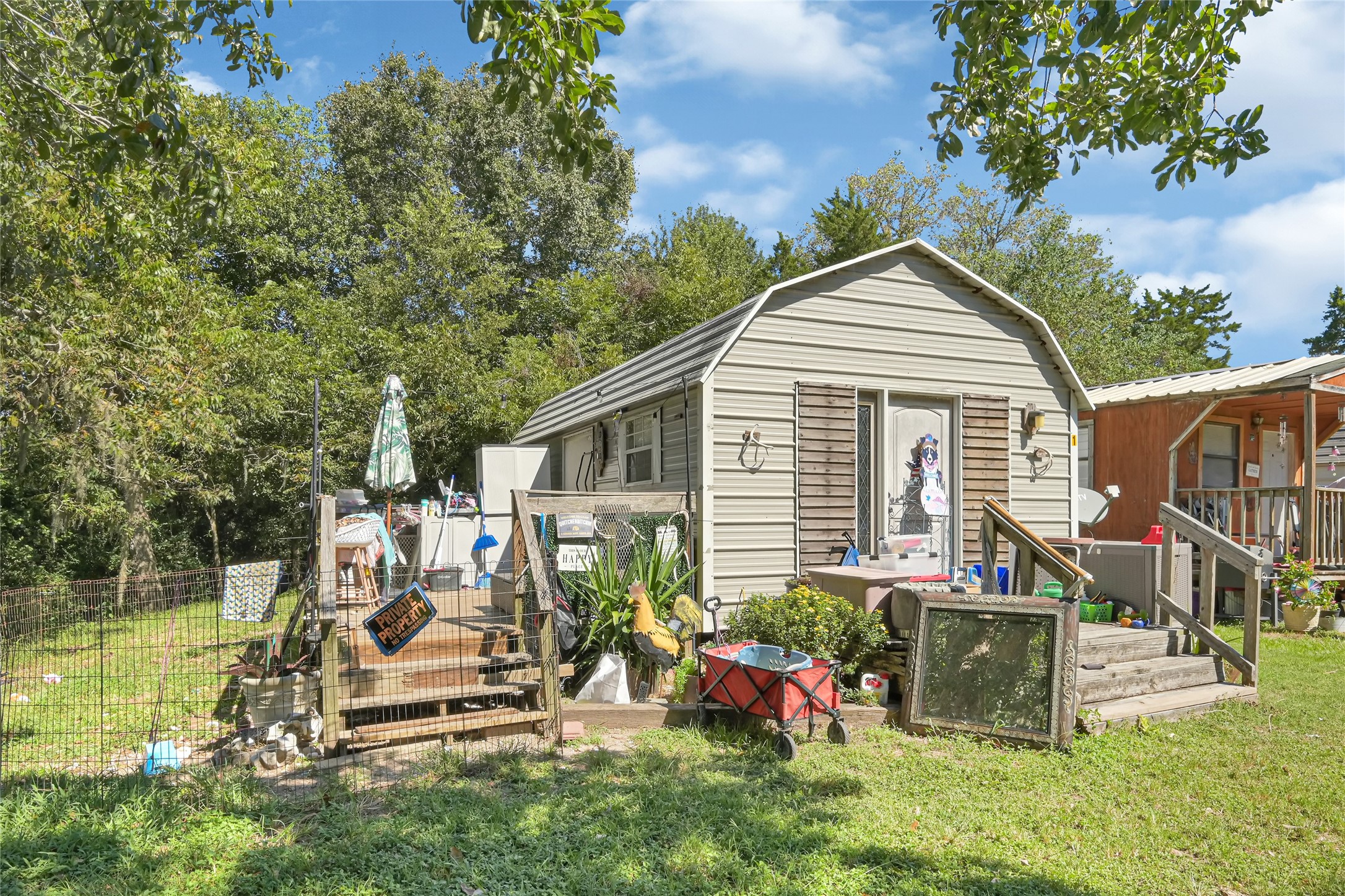 This cottage features a porch perfect for relaxation, decoration, and entertaining guests.