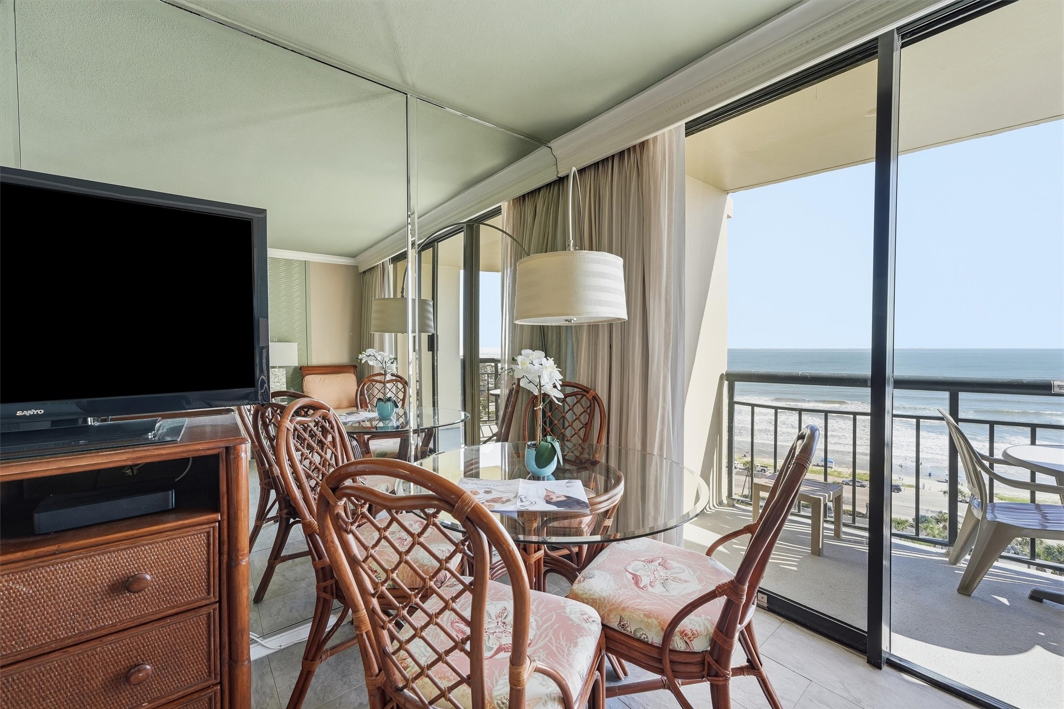 Dine beside expansive glass doors with the Gulf providing a beautiful backdrop.