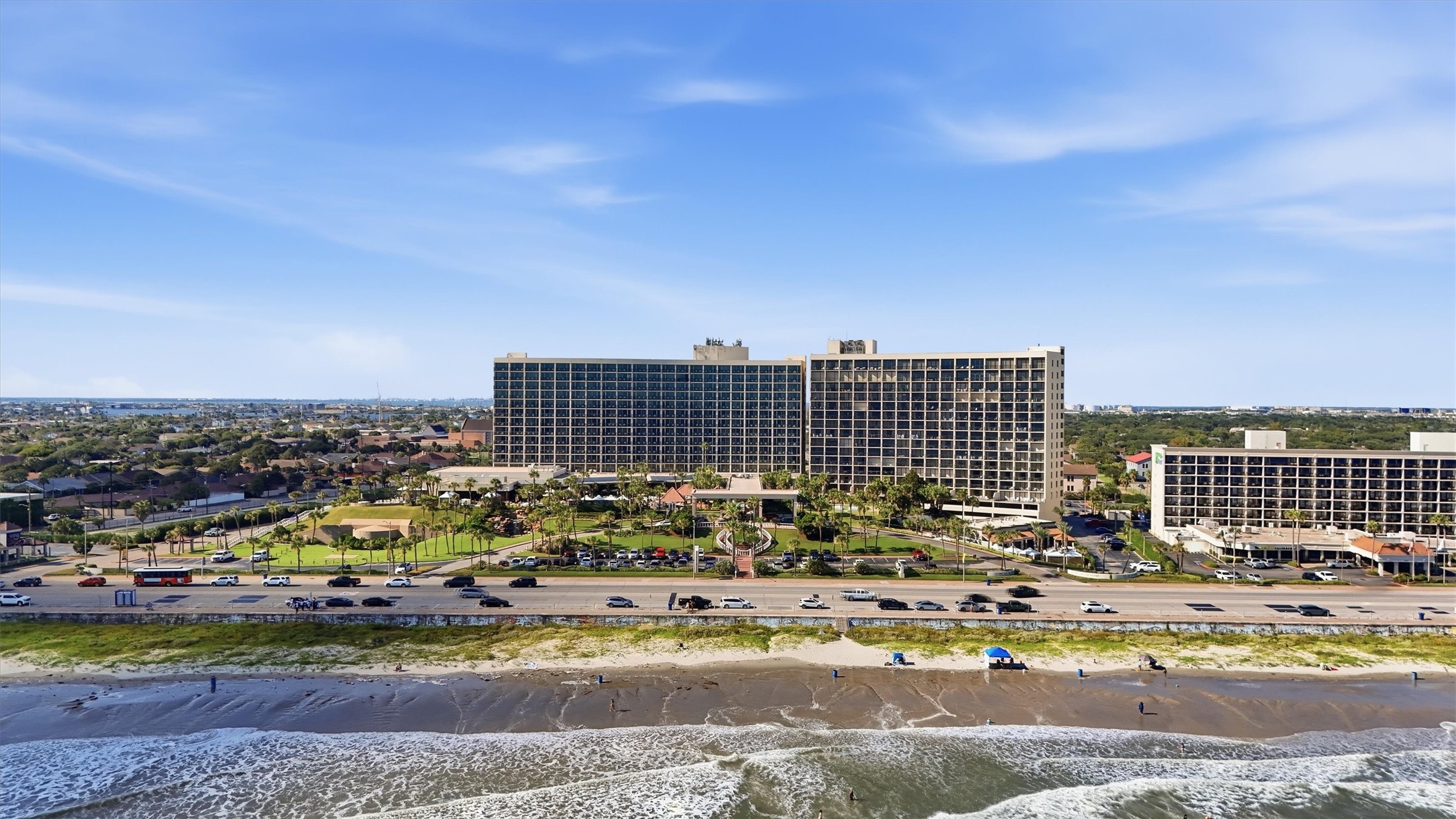 Discover a coastal escape just across Seawall Boulevard from the beach.
