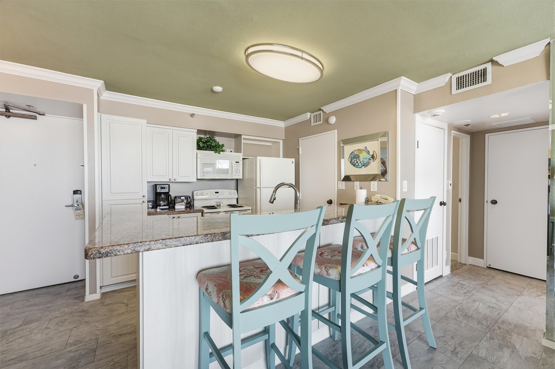 Gather at the breakfast bar for casual meals, morning coffee, or conversation while cooking.
