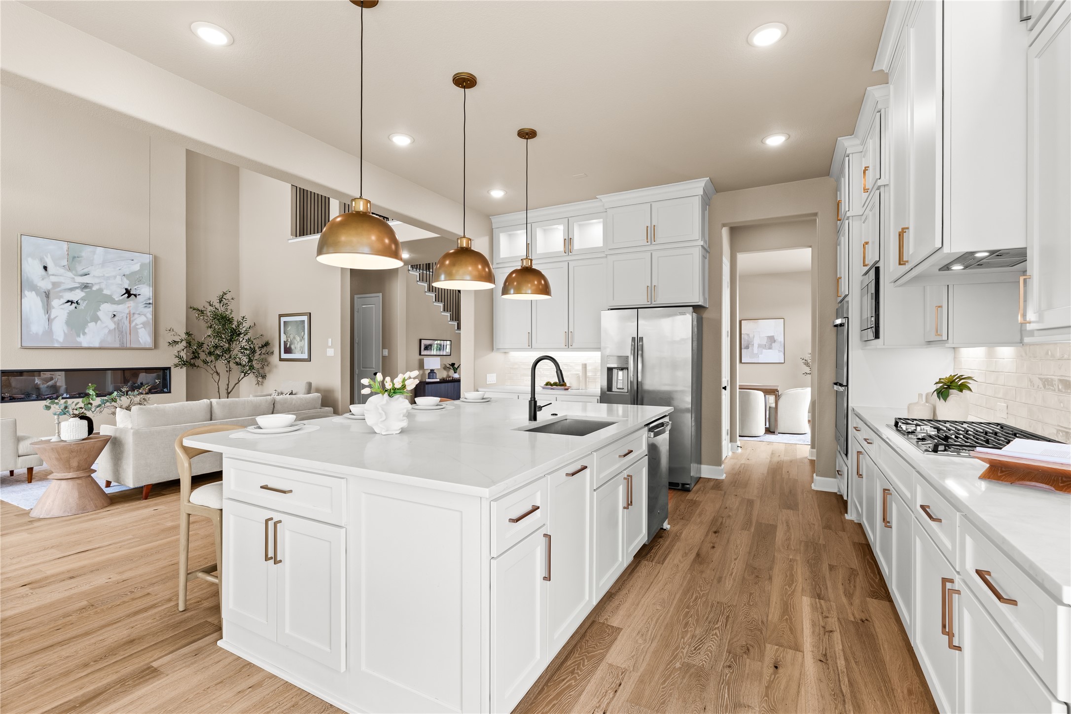Never feel left out of the conversation! Your family and guests can easily mingle between the airy living room and expansive kitchen. *Virtually Staged*