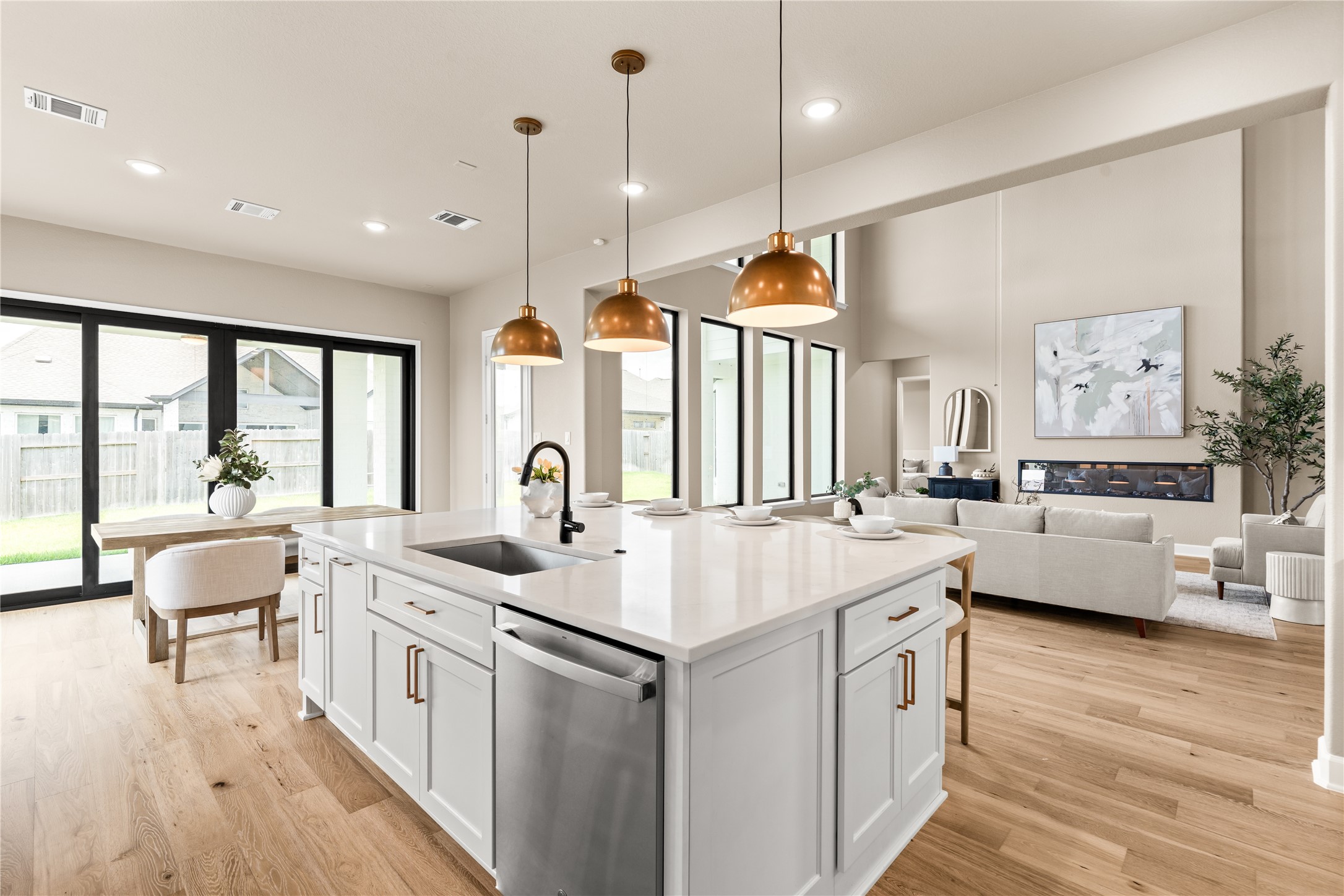 This dream space is ideal for family time and entertaining. The open-concept allows you to simultaneously cook a gourmet meal, interact with people in the living room, and encourage enjoyment of al fresco cocktails. *Virtually Staged*
