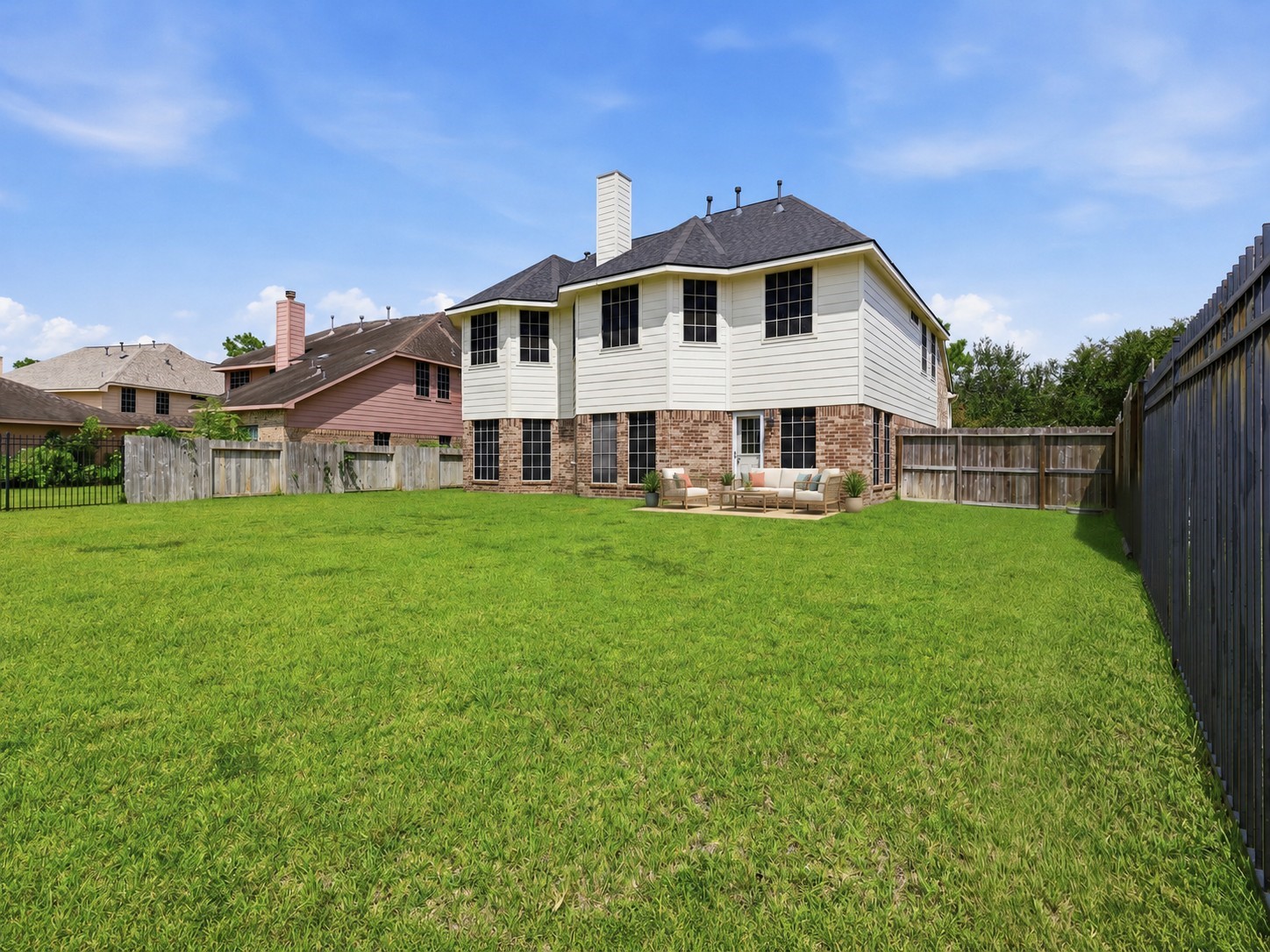 A wide backyard provides generous room for recreation, entertaining, or future outdoor improvements.**Virtually staged