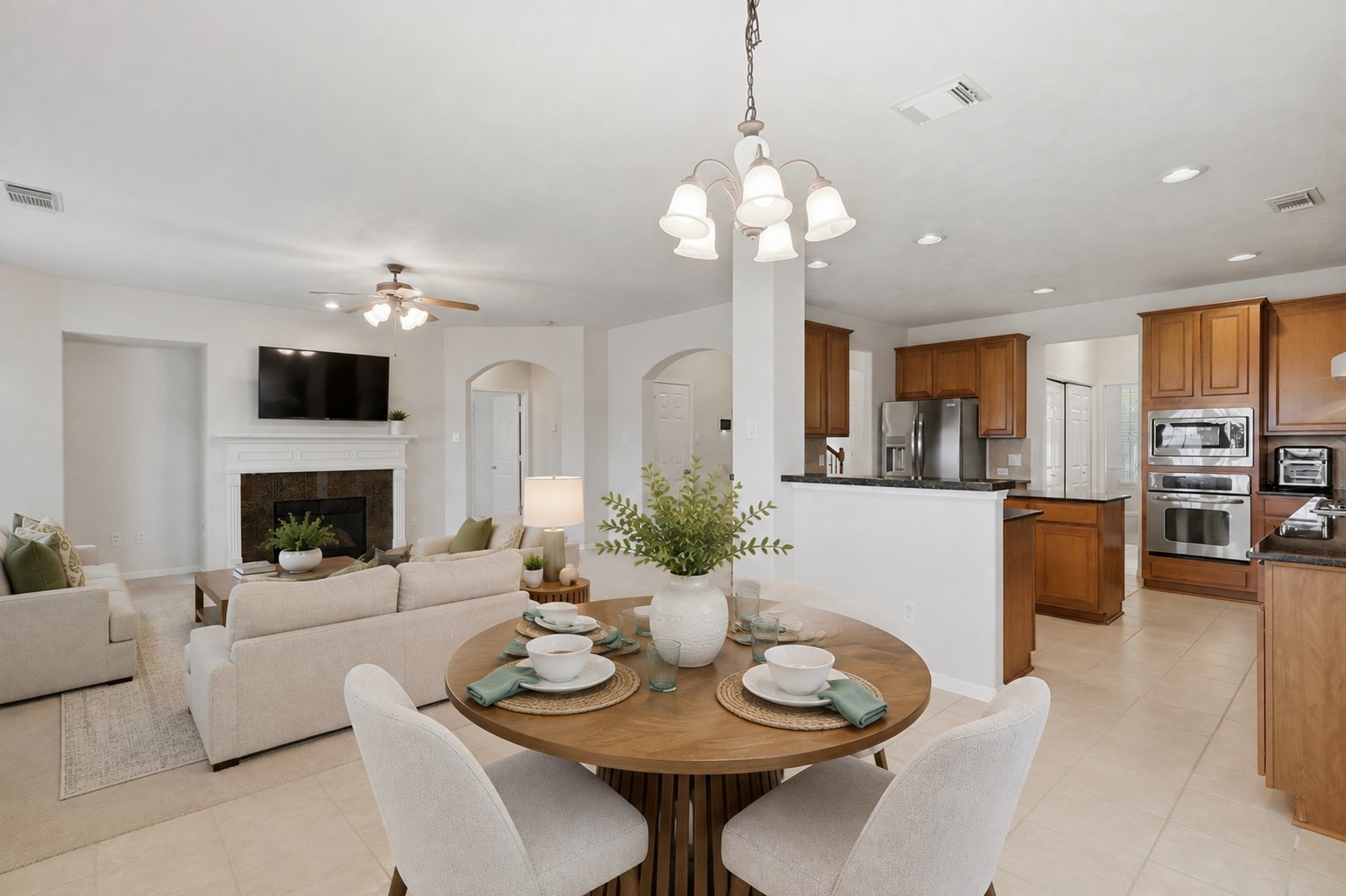 An open-concept layout seamlessly connects the breakfast area, kitchen, and family room for easy everyday living and entertaining.**Virtually staged