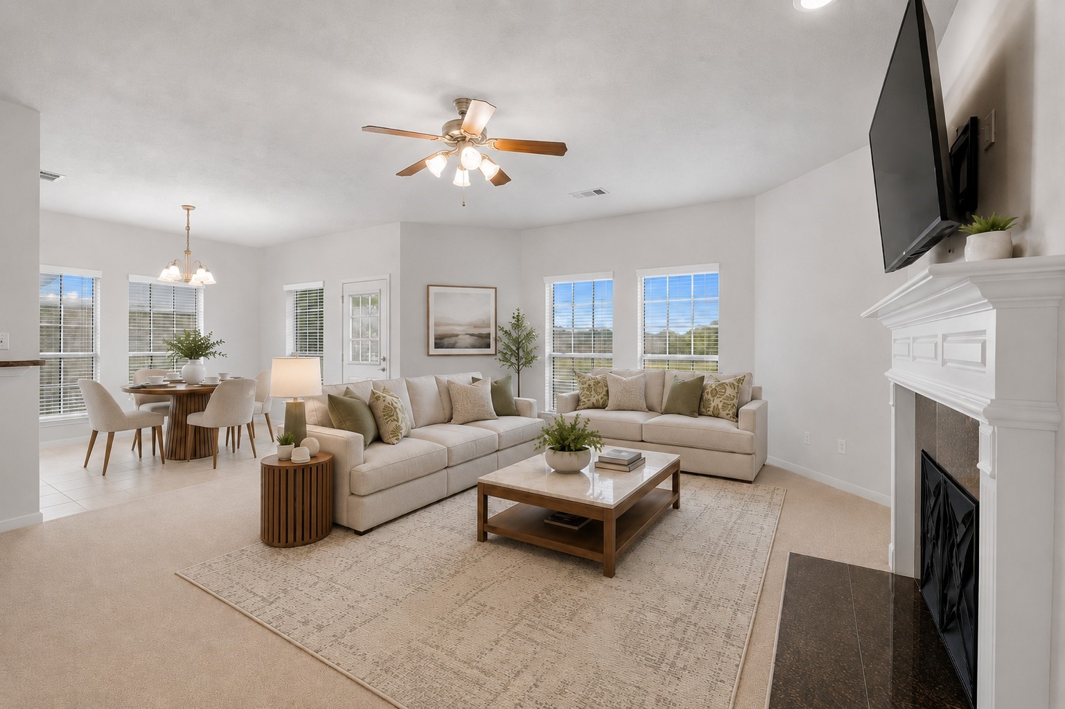 The spacious family room features abundant natural light, a fireplace with mantel, and an open connection to the breakfast area.**Virtually staged
