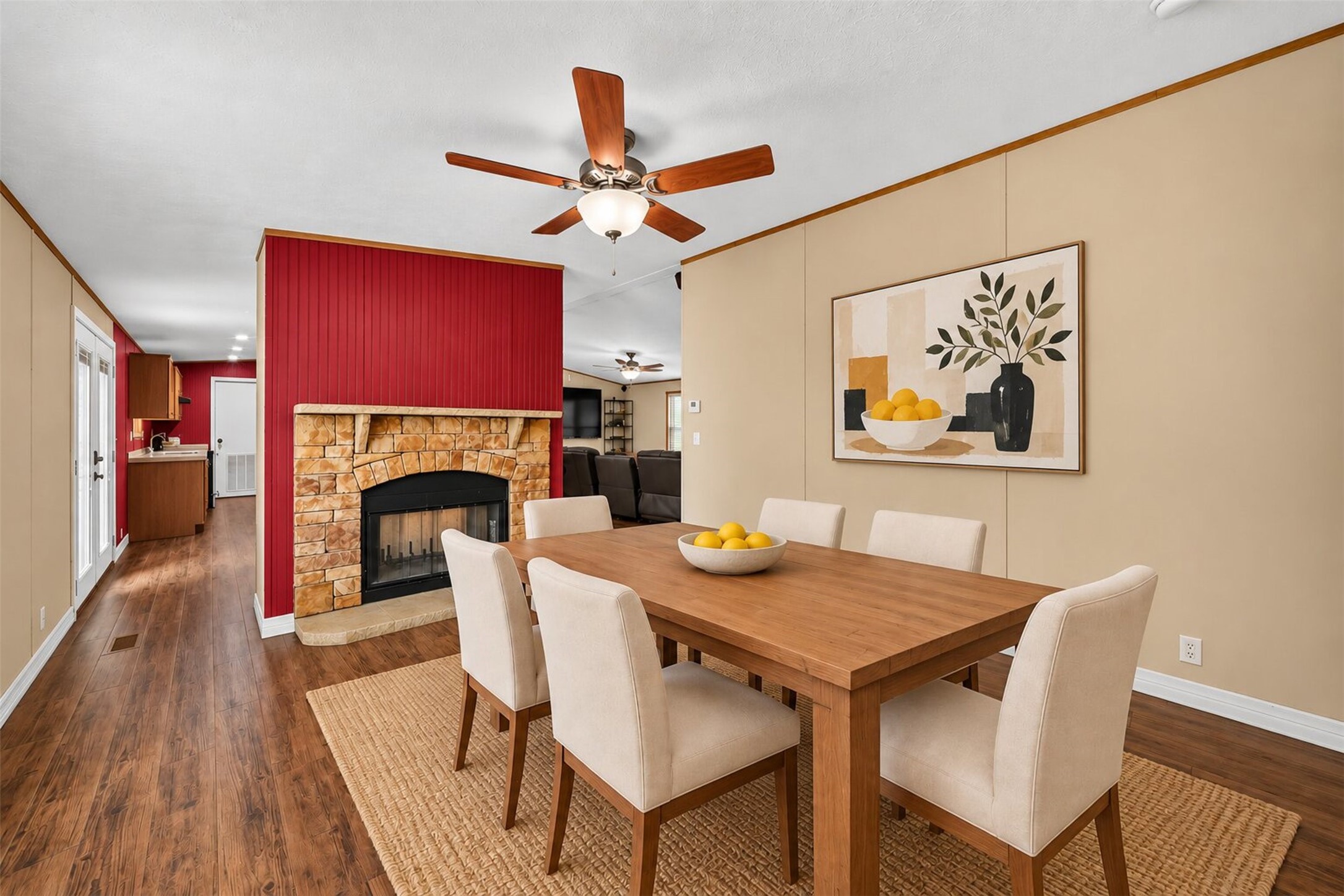 Virtually staged dining area showcasing the rooms potential for comfortable dining and entertaining.