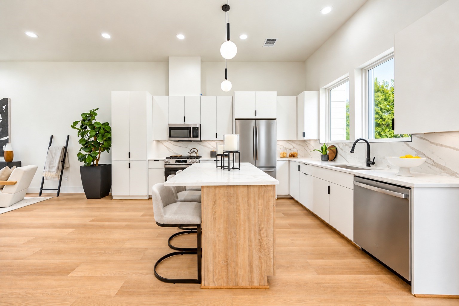 Kitchen with gas cooking, ample cabinet storage, under-cabinet lighting and an island with seating. *Refrigerator virtually added.