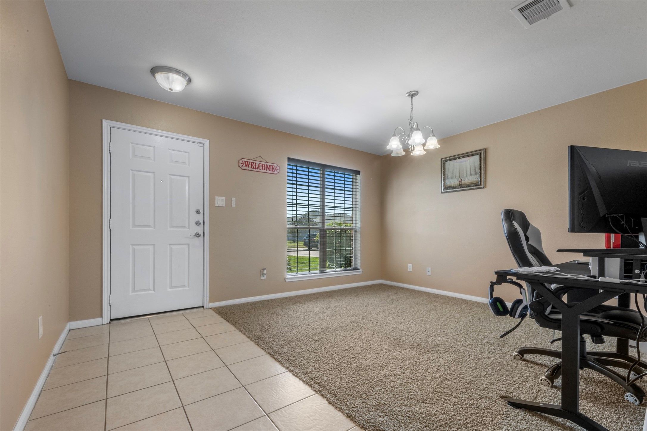 Formal dinning area, currently used as an office.