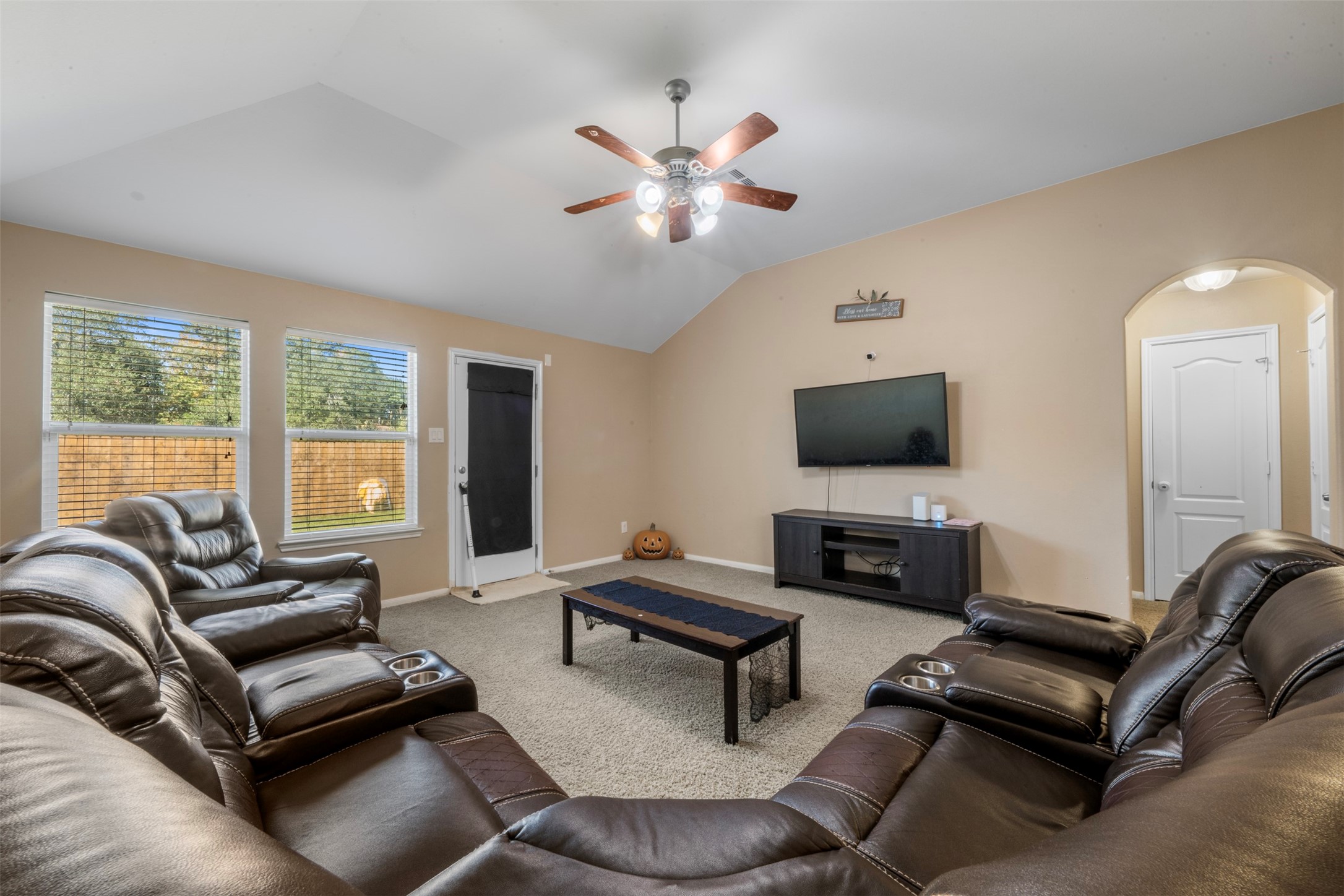 Living room with view of the back yard.