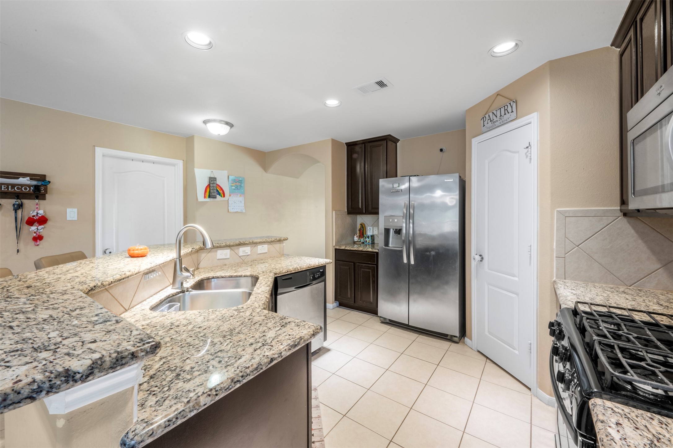 Enjoy the open kitchen space and bar for a quick casual breakfast.