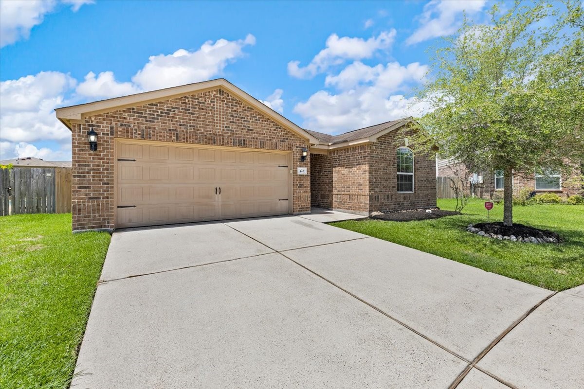 Two car garage with plenty driveway space