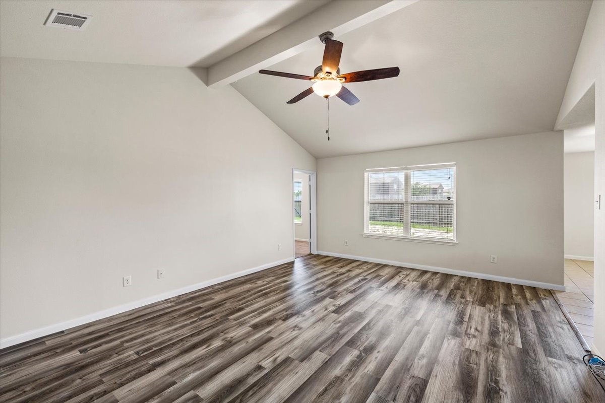 Living area with high ceilings has open feel