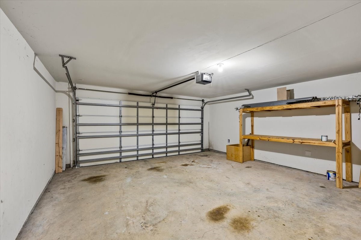 Two car garage with storage shelves