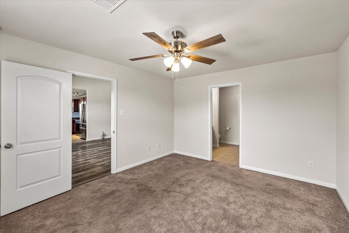 Primary bedroom, opposite side of the other three bedrooms