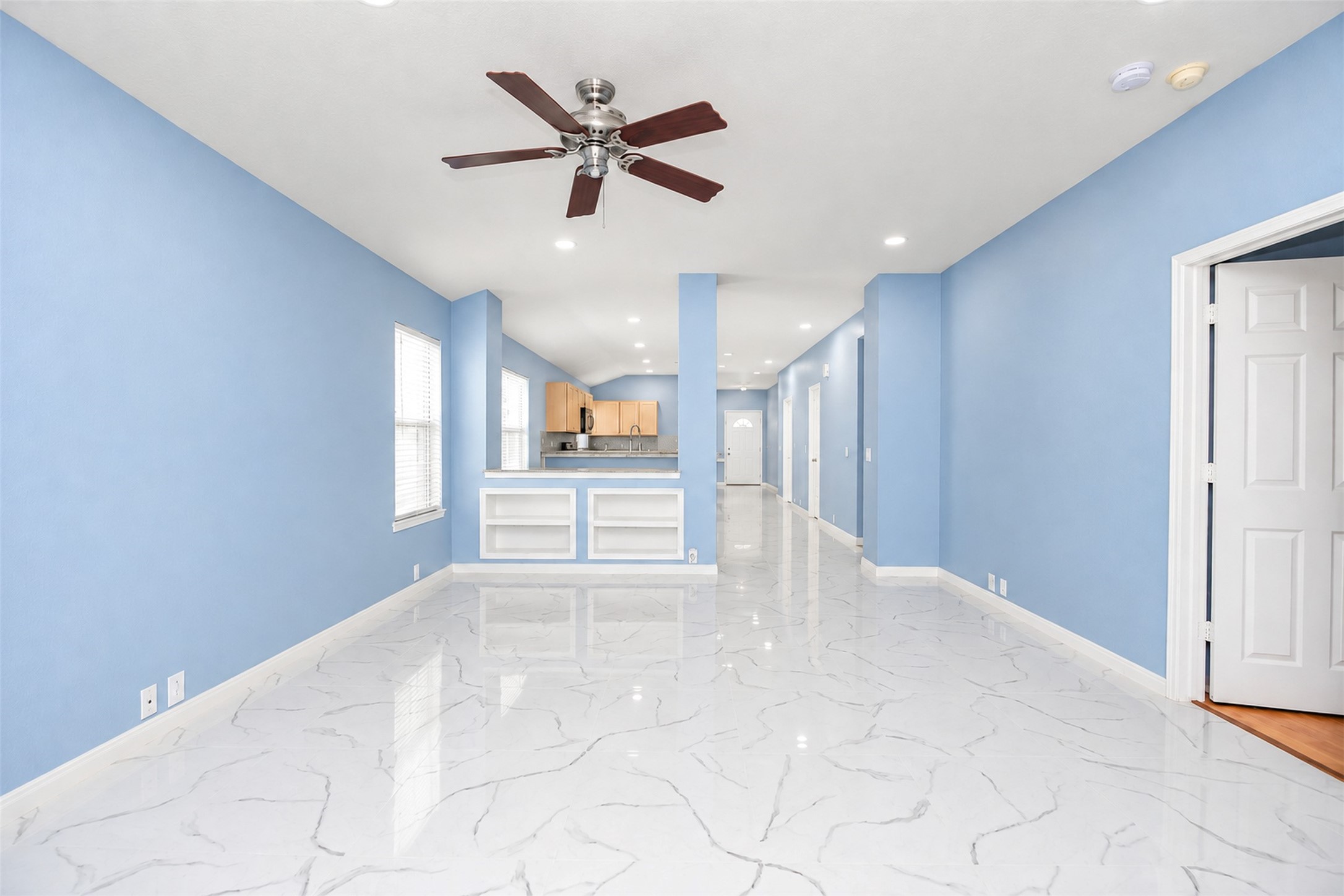 Living Area
***Property is vacant. Photo digitally enhanced with AI; lighting, color, and ceiling appearance adjusted. ***