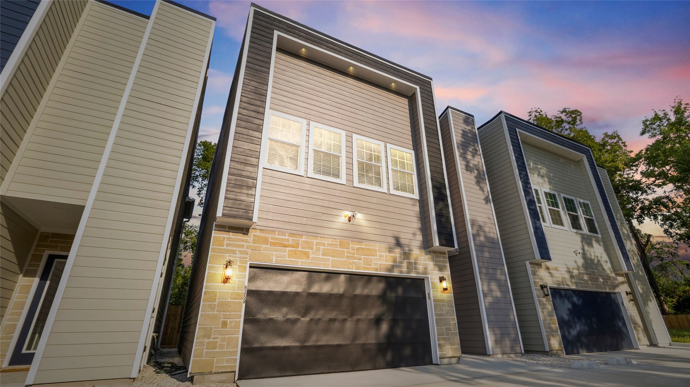 From this angle, you see just how much space you own out front. Whether its guests pulling up for dinner, kids shooting hoops on the driveway, or your cars lined up side by side, this spot feels both practical and picture-perfect.