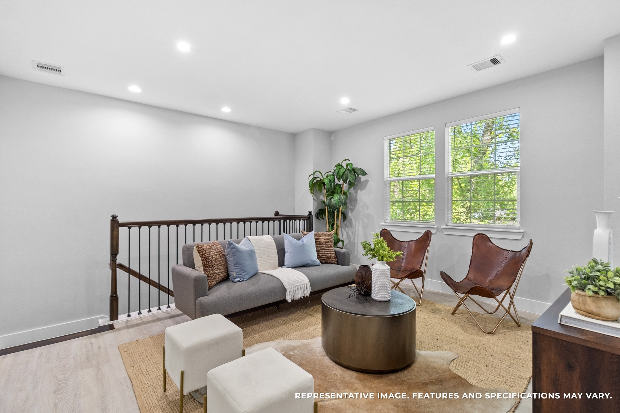 With its open railing overlooking the stairs, the loft feels connected yet private, giving you a retreat within your own home.