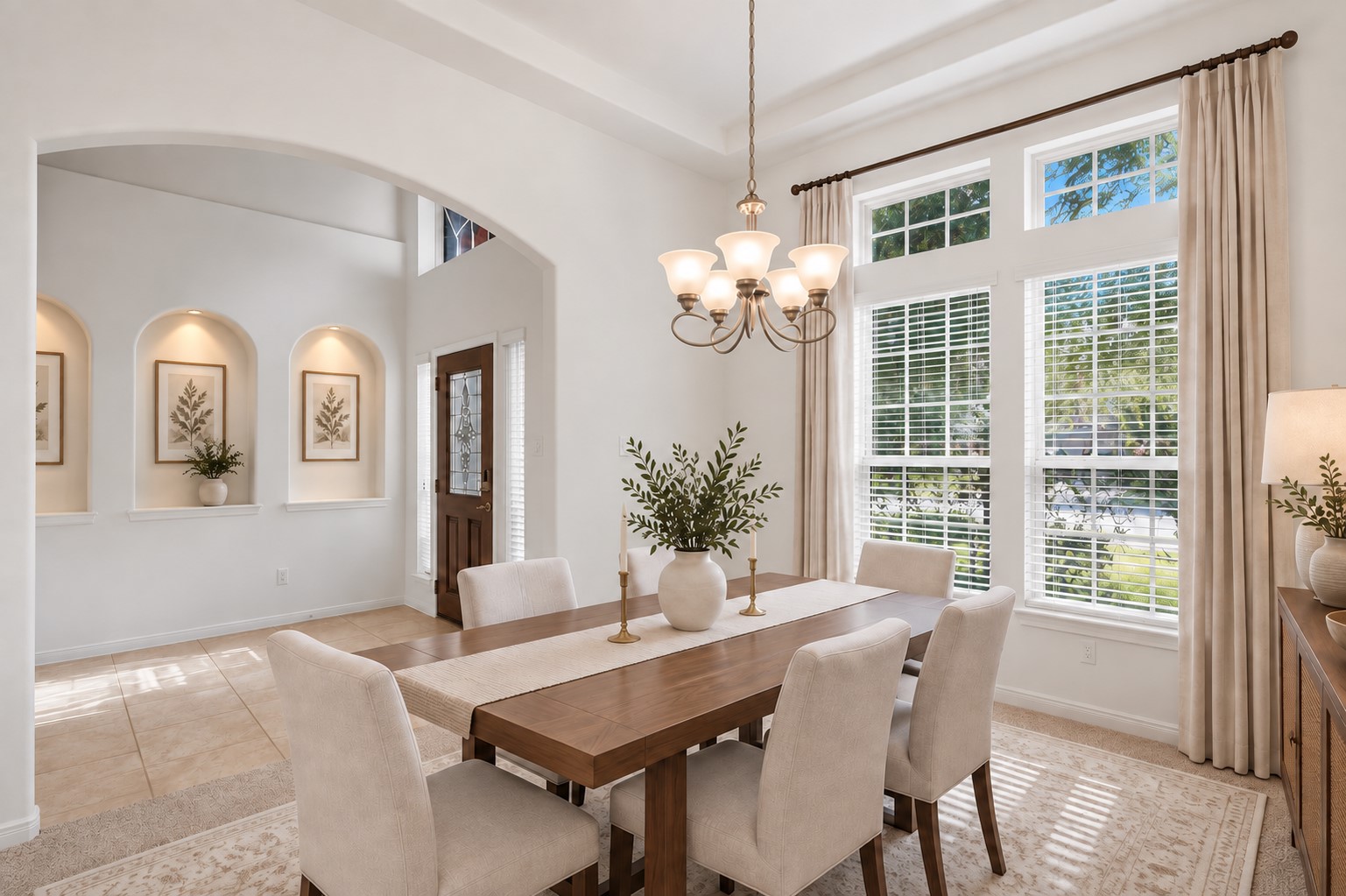 Elegant Details Make This Dining Space Shine! Beautiful architectural arches connect the formal dining room with the welcoming foyer, while the coffered ceiling and large windows add an extra touch of elegance. There is wonderful natural light throughout, making this a lovely setting for entertaining family and friends. *Photo is virtually staged* Elegant Details Make This Dining Space Shine! Beautiful architectural arches connect the formal dining room with the welcoming foyer, while the coffered ceiling and large windows add an extra touch of elegance. There is wonderful natural light throughout, making this a lovely setting for entertaining family and friends. *Photo is virtually staged*