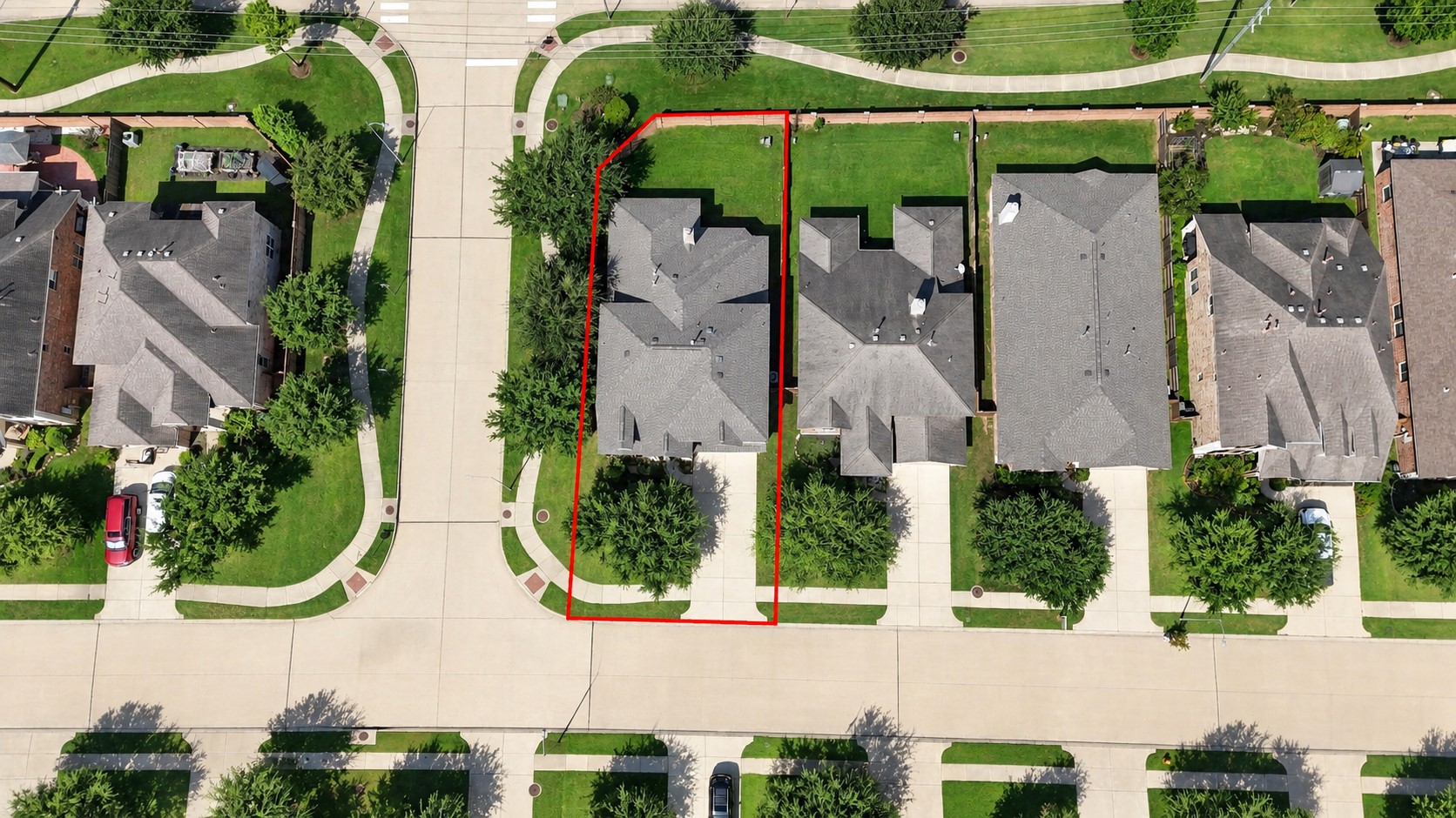 Aerial View Showcasing This Wonderful Corner Lot! This birds-eye view clearly highlights the home's generous corner lot, beautifully maintained lawn, landscaped surroundings, and spacious footprint. The property enjoys a great position within the neighborhood, with attractive streetscapes and mature landscaping adding to its appeal.