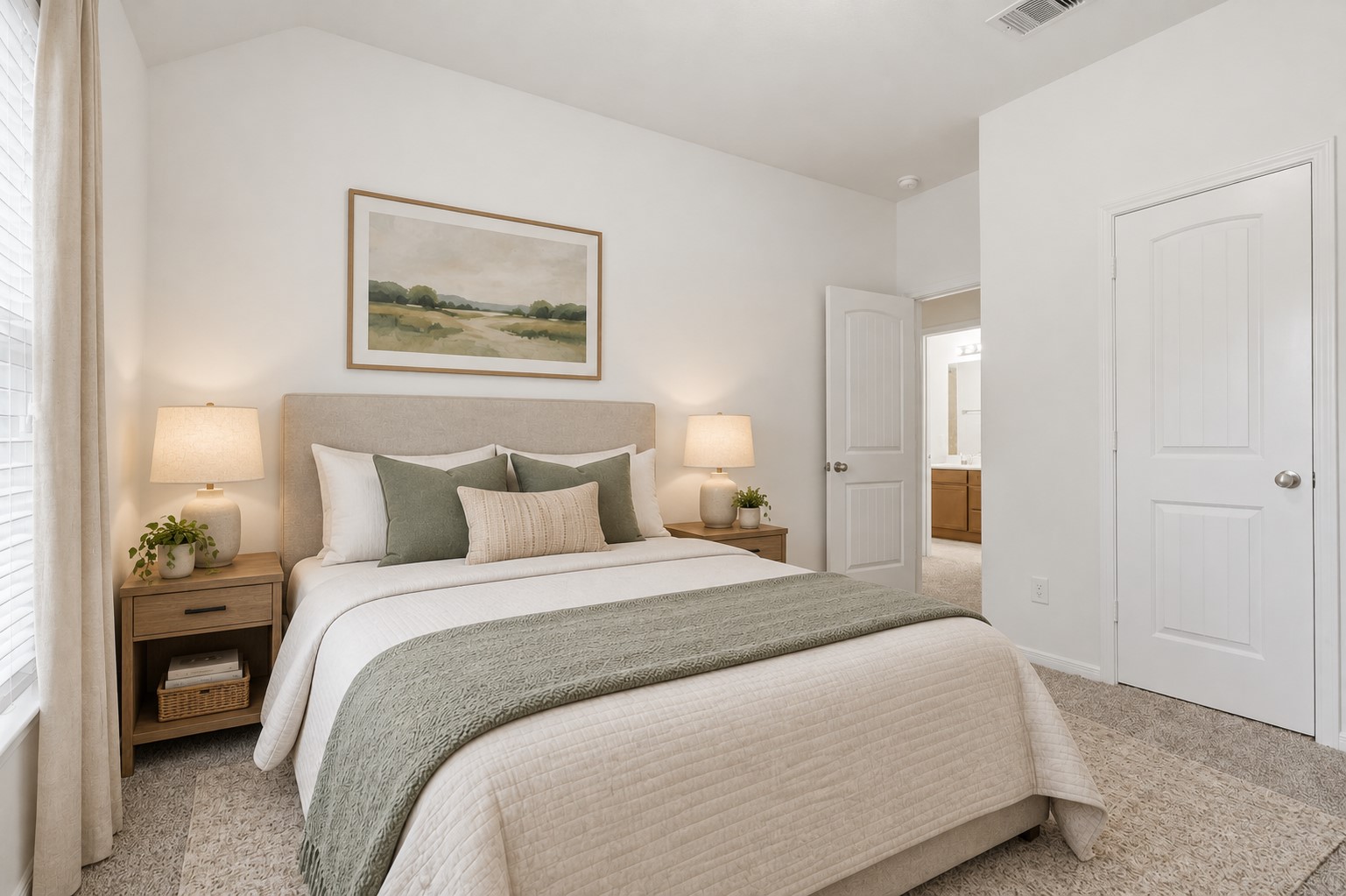 Another Lovely View of This Comfortable Bedroom! From this angle, you can appreciate the spacious layout, plush carpeting, large window, and beautiful natural light. The neutral finishes create a peaceful backdrop, while the generous floor space offers plenty of flexibility for furniture and personal touches. A comfortable and inviting room for family or guests! *Photo is virtually staged*