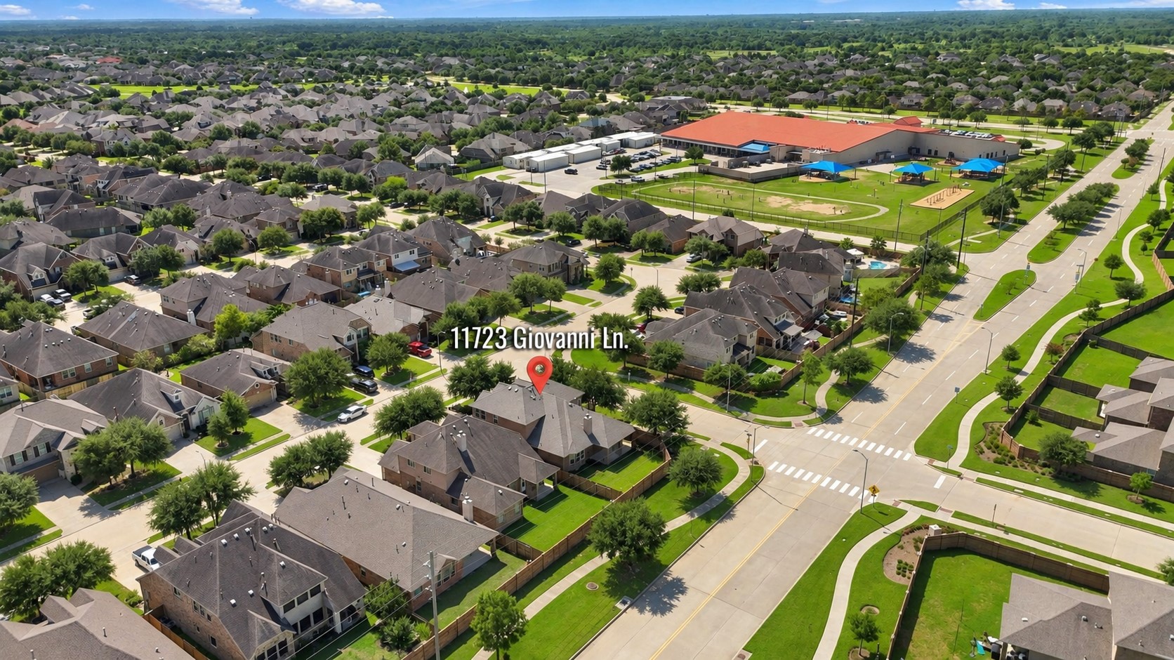 Wonderful Community Setting! This elevated view showcases the beautifully planned neighborhood, winding streets, landscaped homesites, and surrounding amenities. The spacious community layout and abundant green spaces create an inviting setting that is easy to appreciate from above.