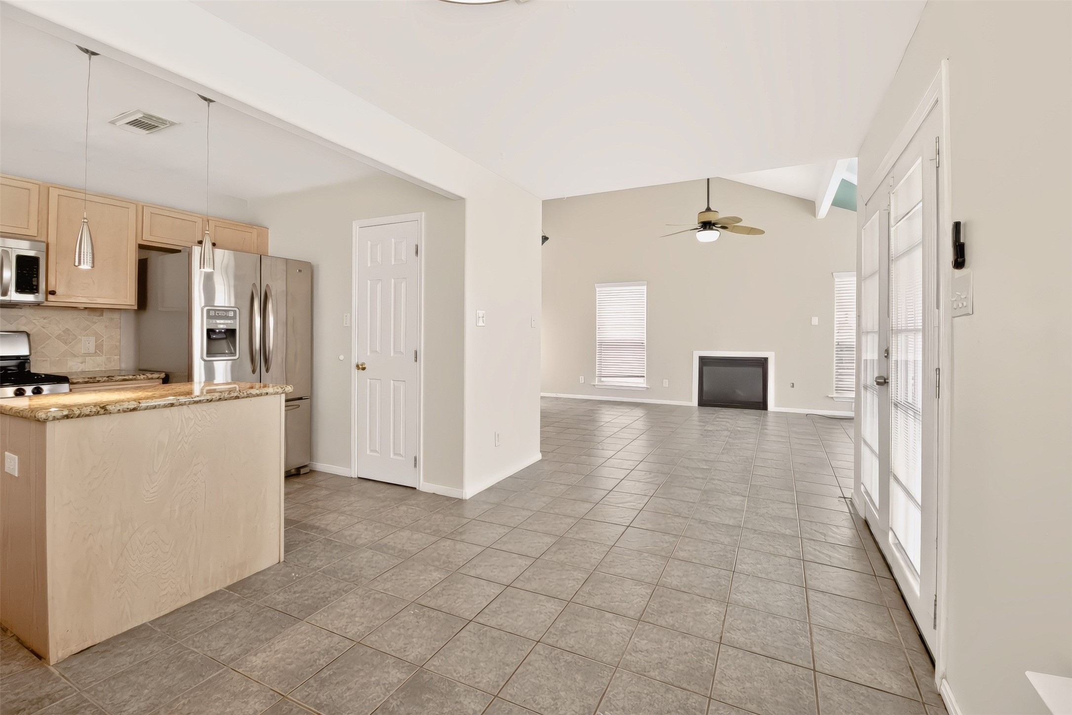 OPEN CONCEPT WITH LIVING ROOM, KITCHEN AND DINING AREA