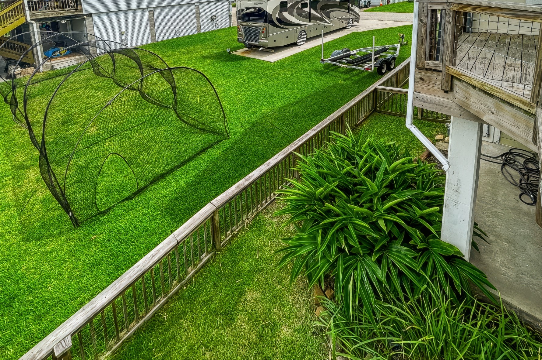 ANOTHER SIDE AREA OF FENCED BACKYARD